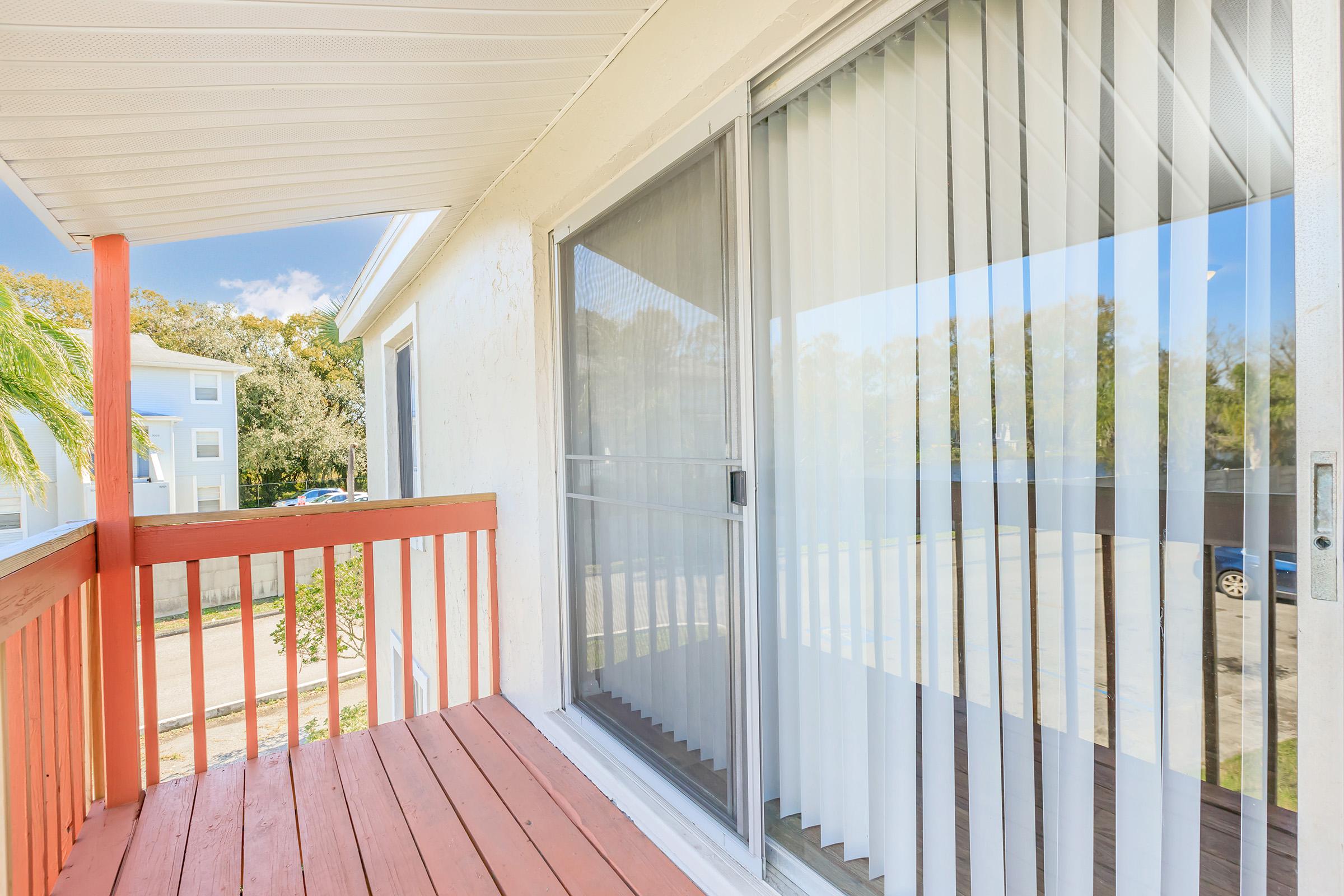 a room with a wooden fence