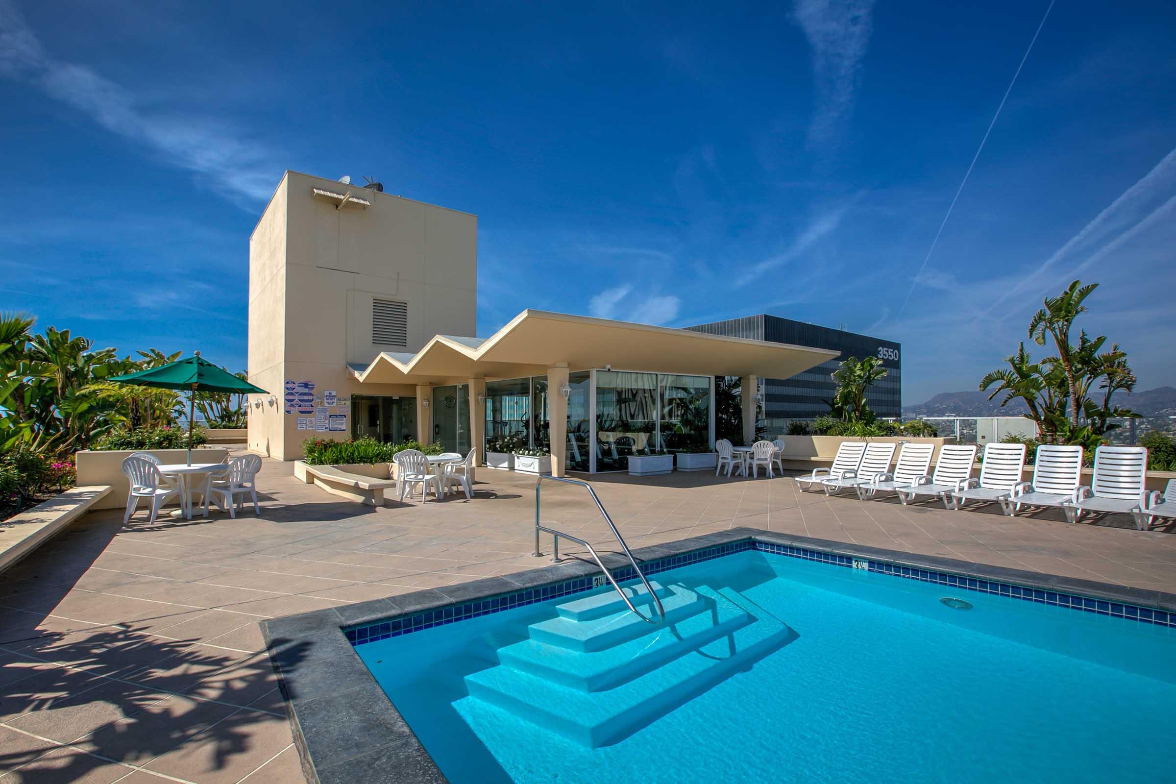 a large swimming pool with steps