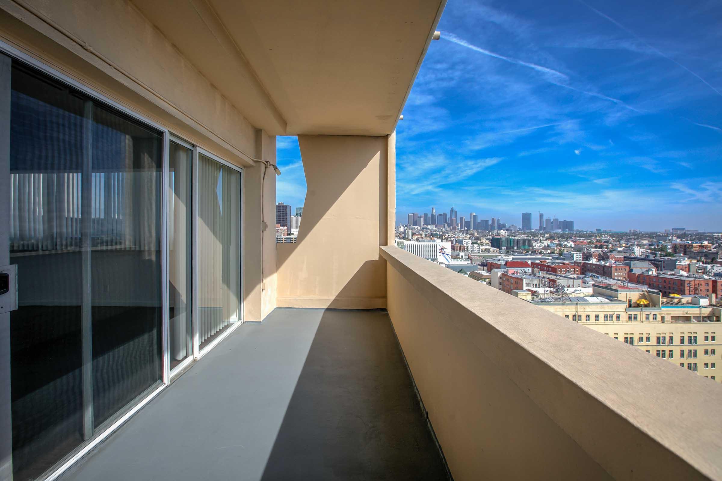 a view of the city from a balcony