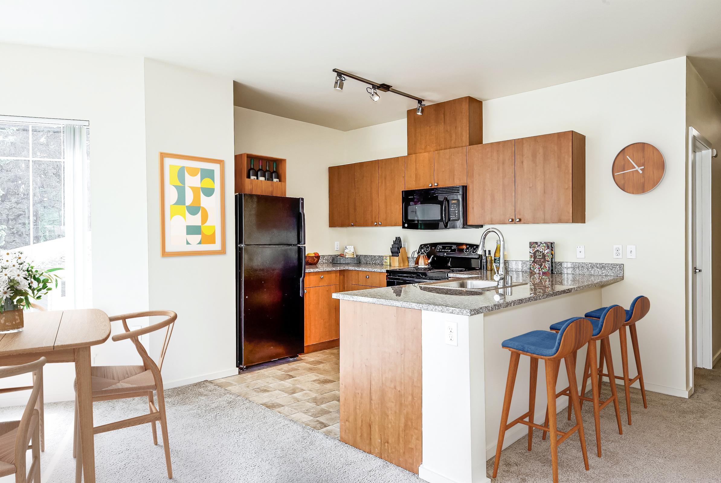 a kitchen with a dining room table