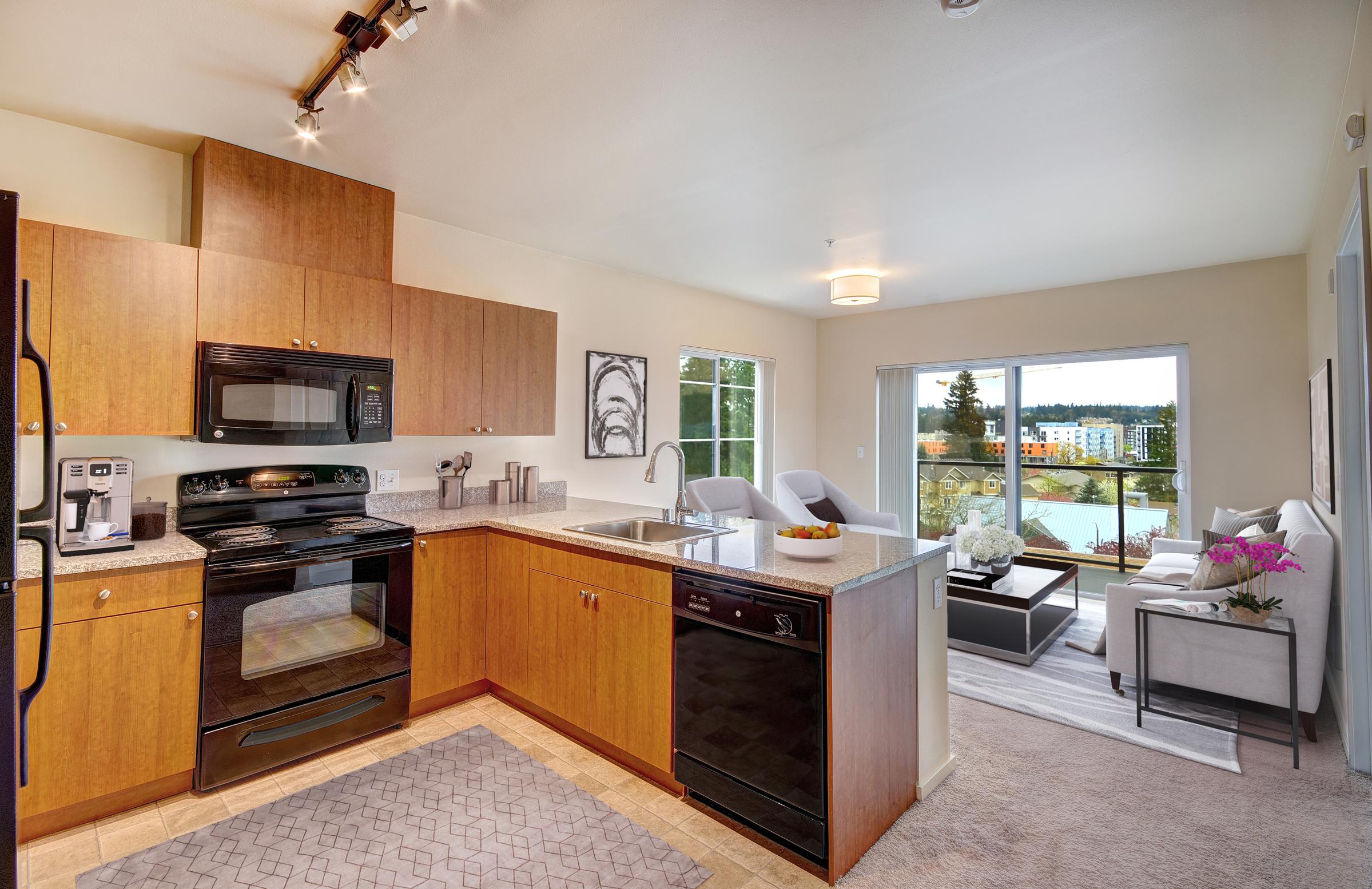 a kitchen filled with lots of furniture