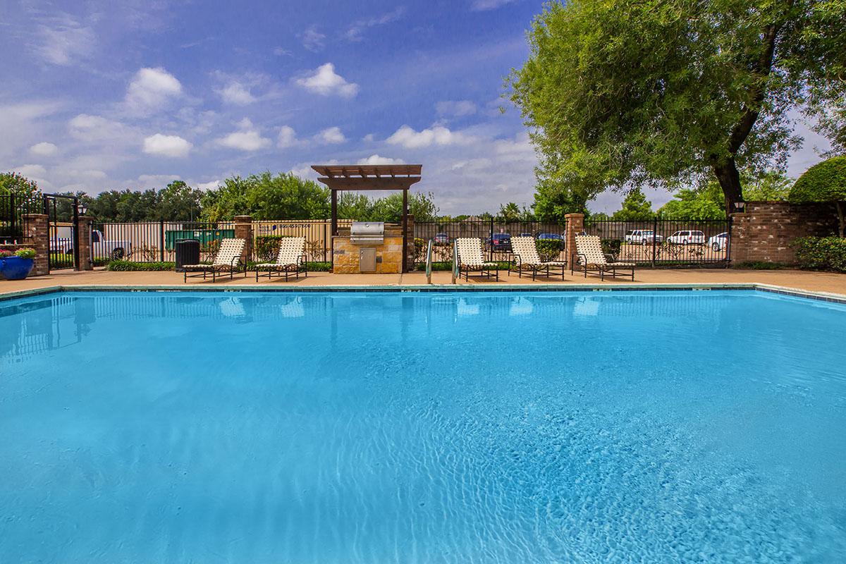 a pool next to a body of water