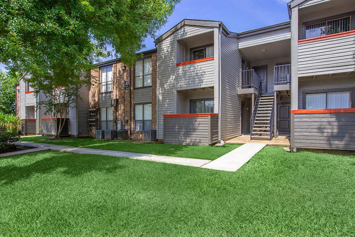 a large lawn in front of a house