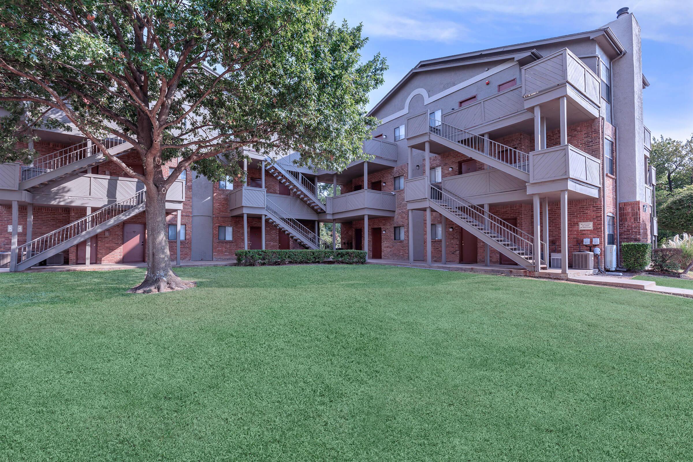 a large lawn in front of a house