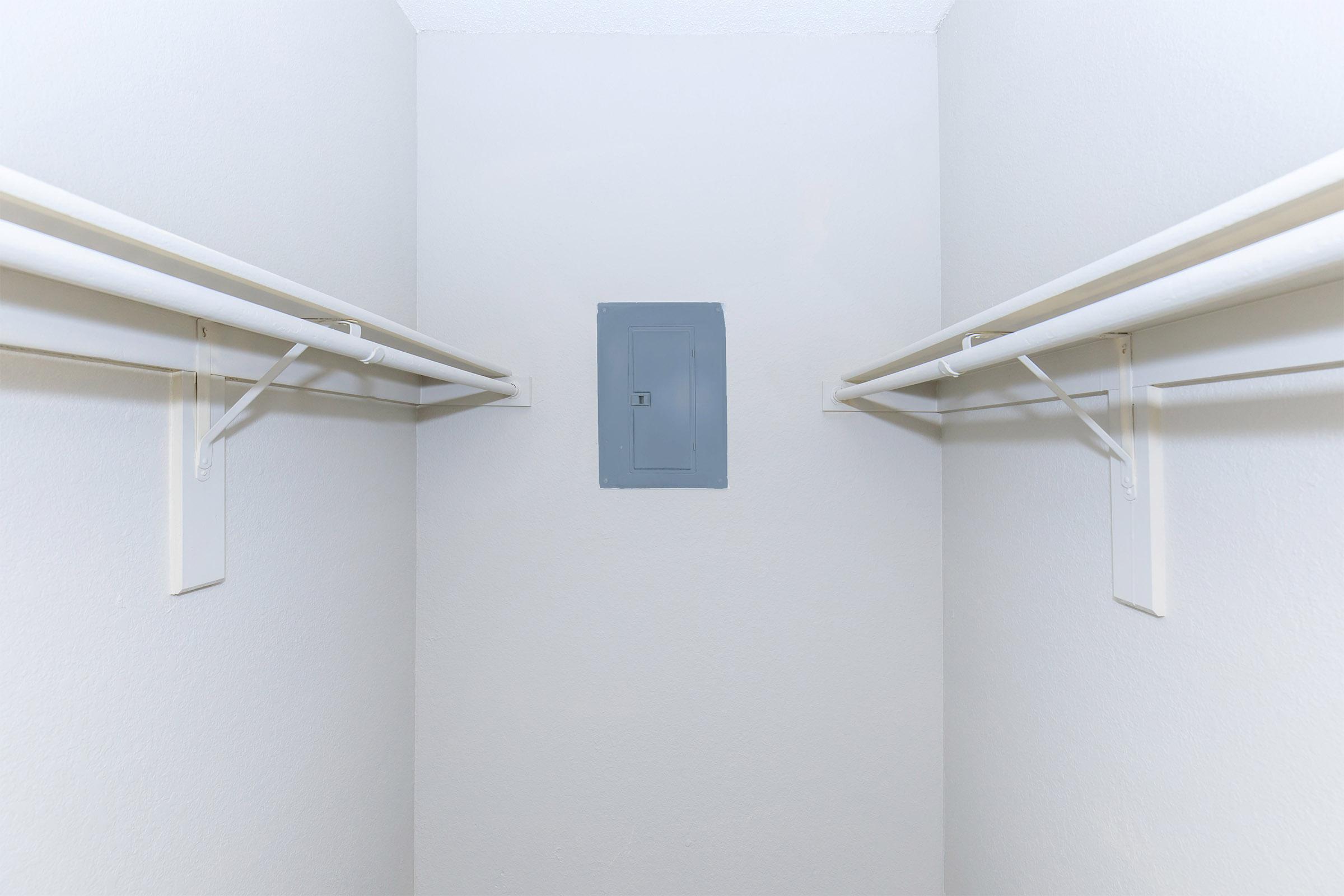 a white refrigerator freezer sitting inside of a building