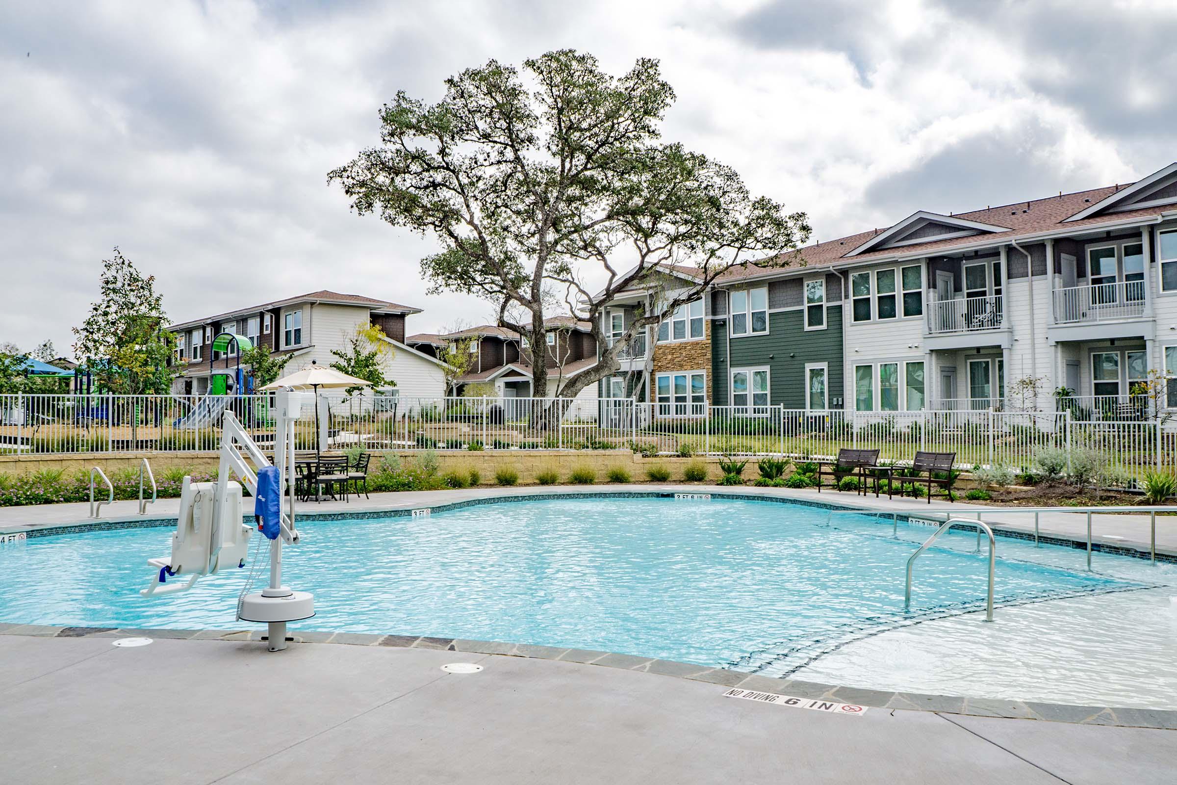 a pool next to a body of water