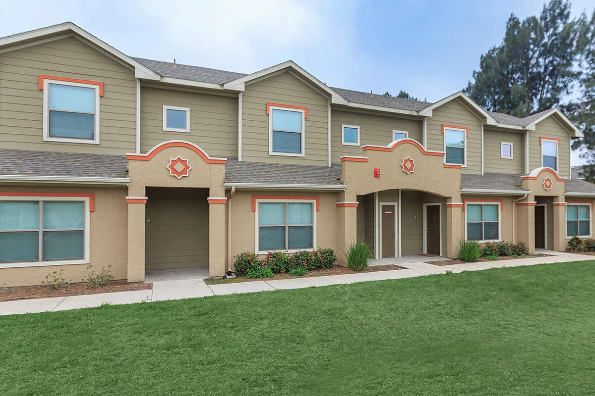 a large lawn in front of a house