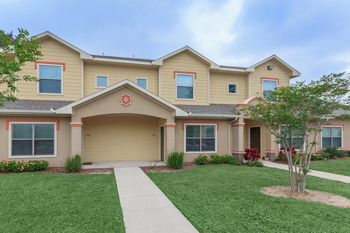 a large lawn in front of a house