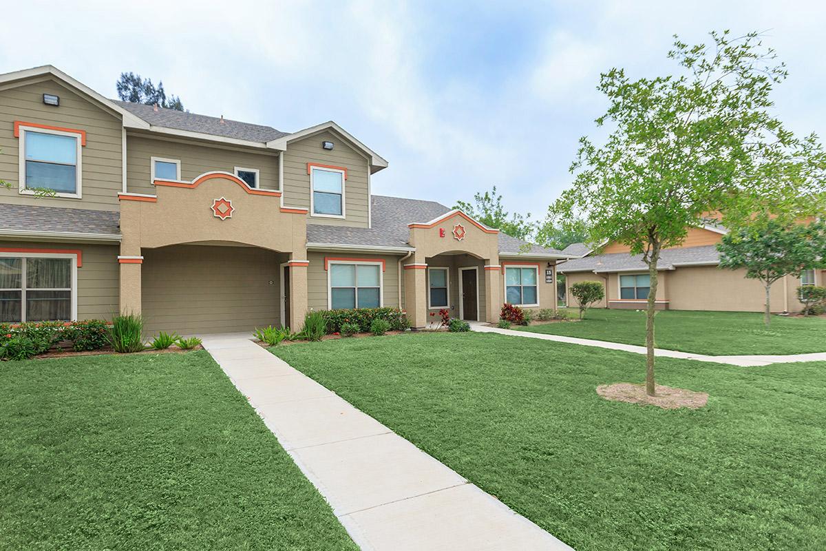 a large lawn in front of a house