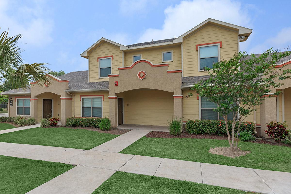 a large lawn in front of a house