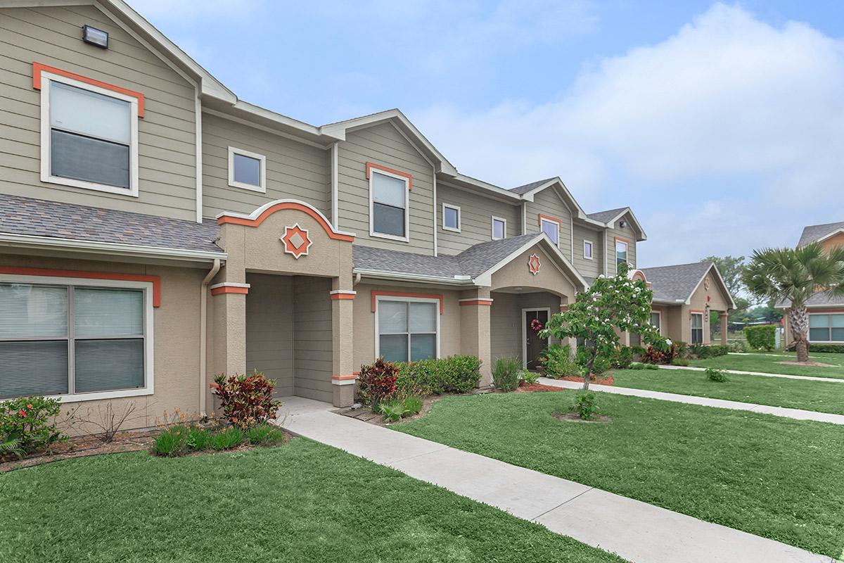 a large lawn in front of a house