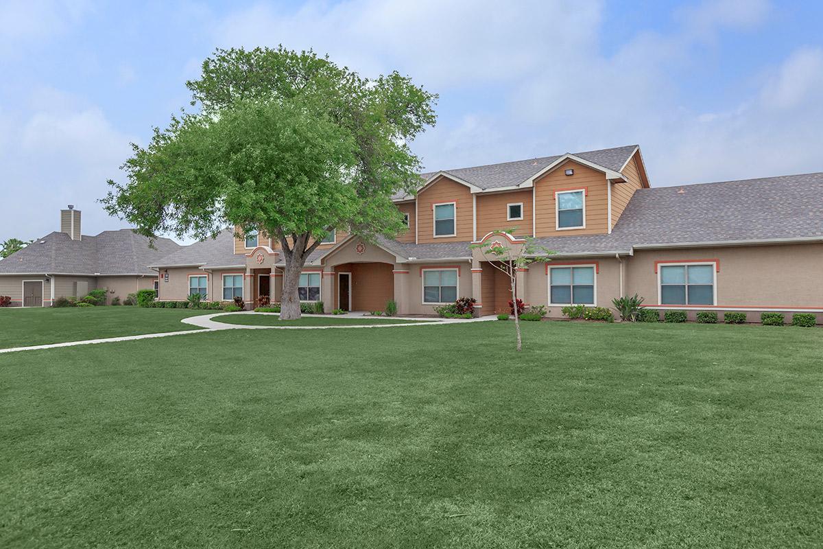 a large lawn in front of a house