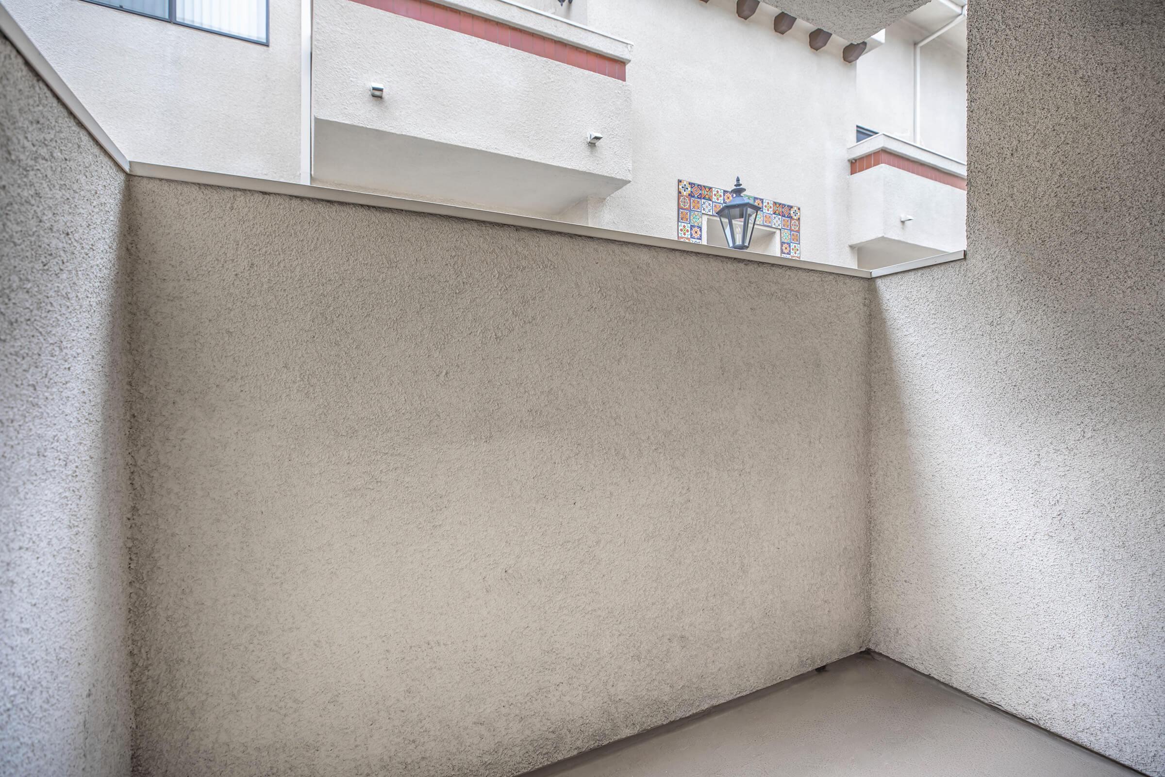 a white refrigerator freezer sitting inside of a building