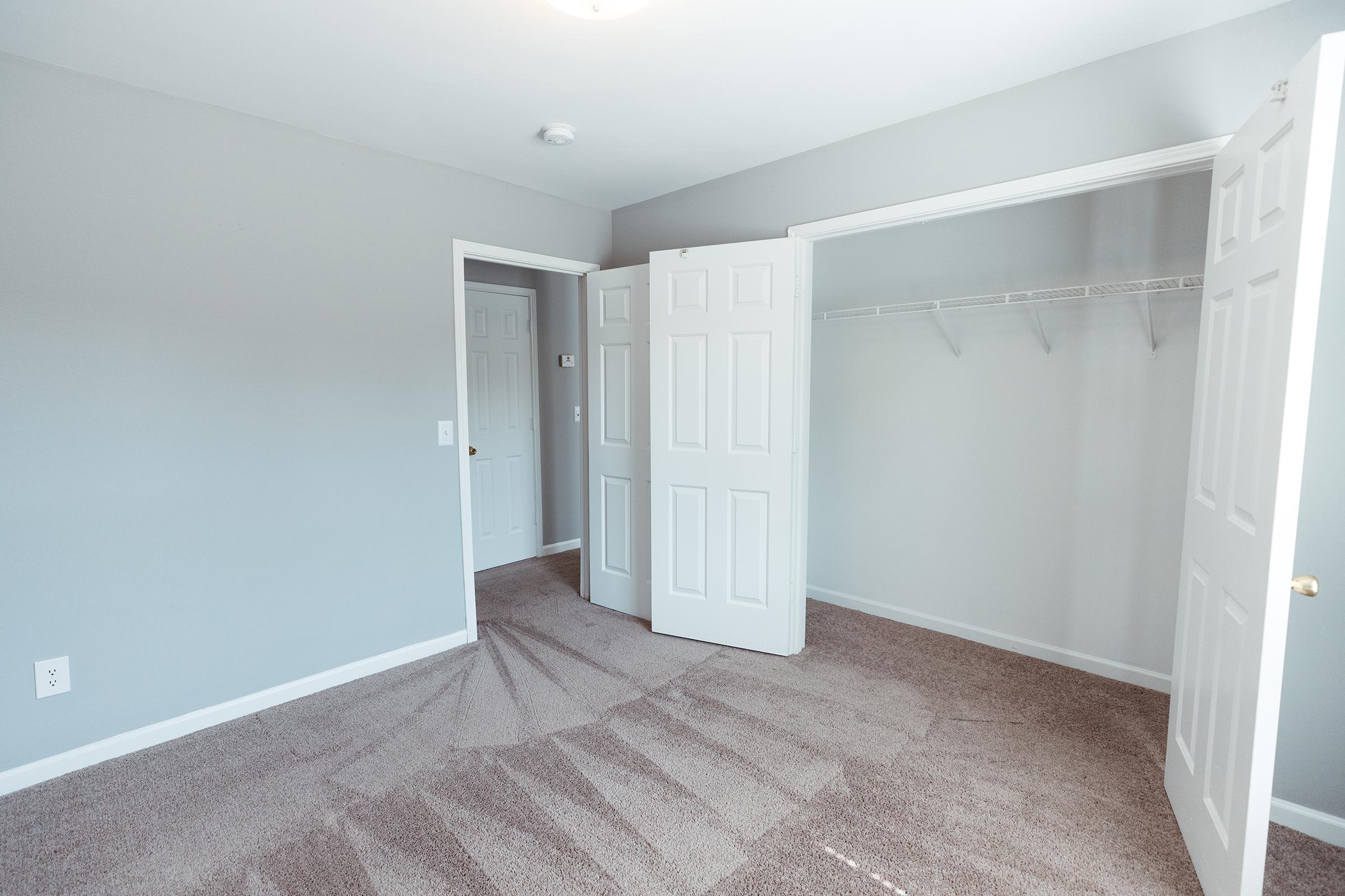 Bedroom with inner closet view.