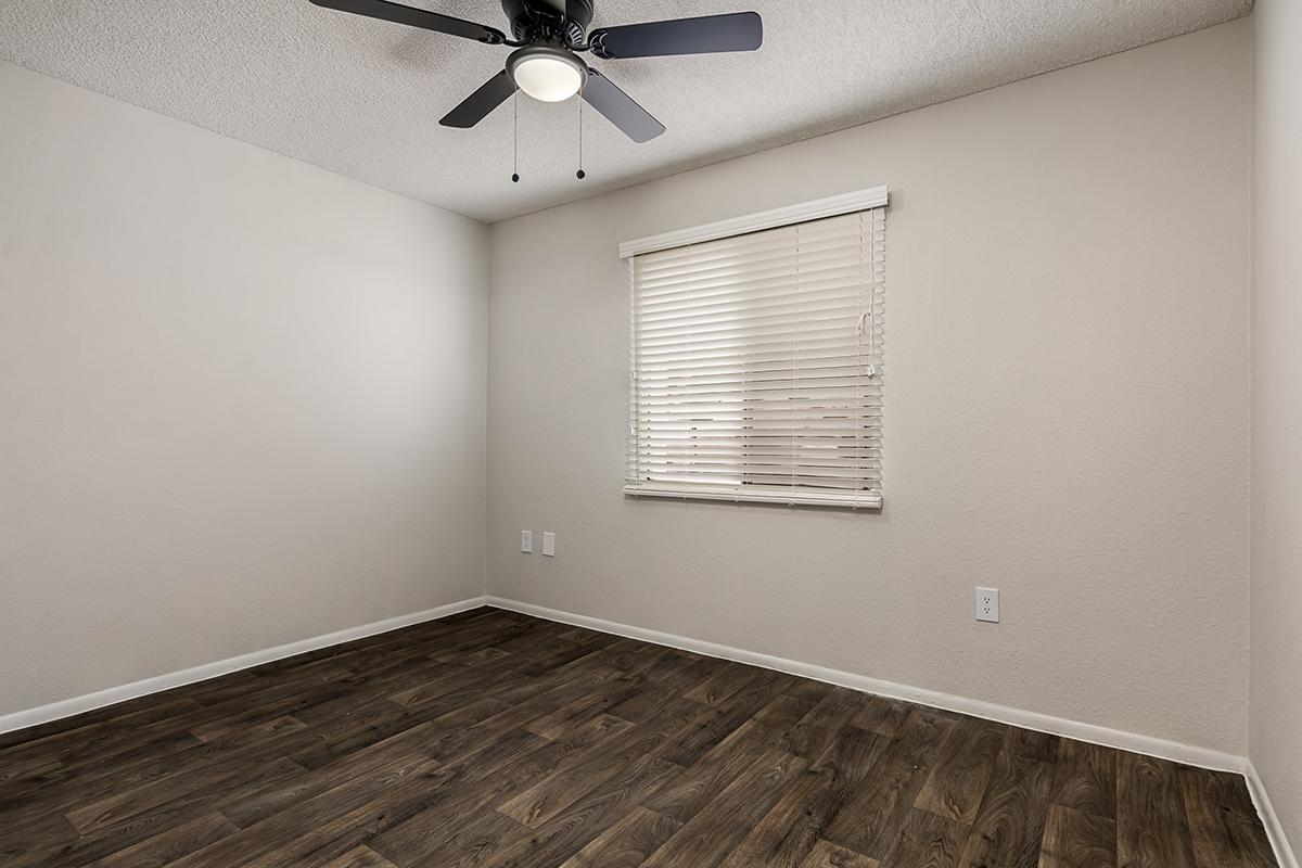 Bedroom with Wood-Style Flooring - The Gallery Apartments - Tempe - Arizona