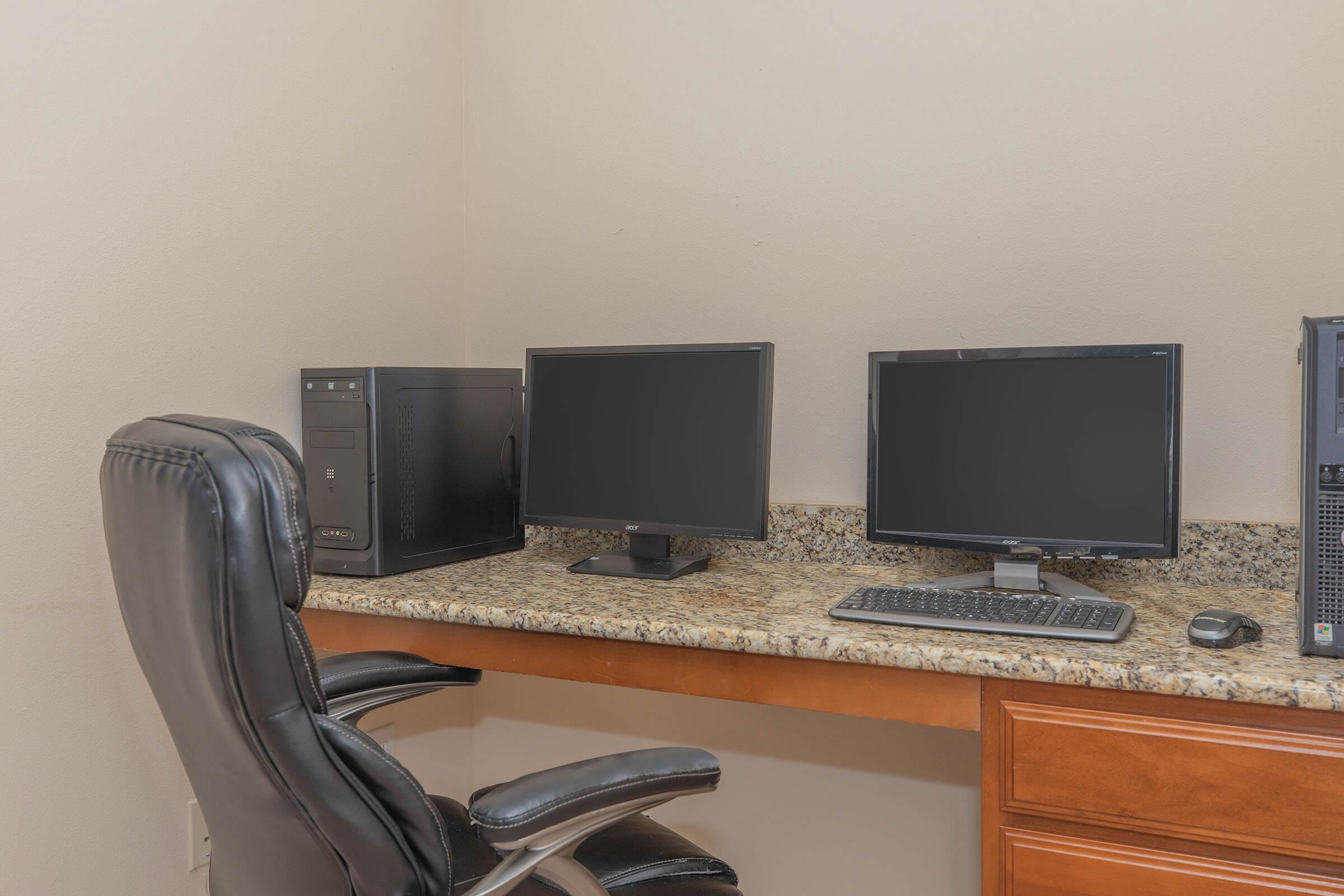 a desktop computer sitting on top of a desk