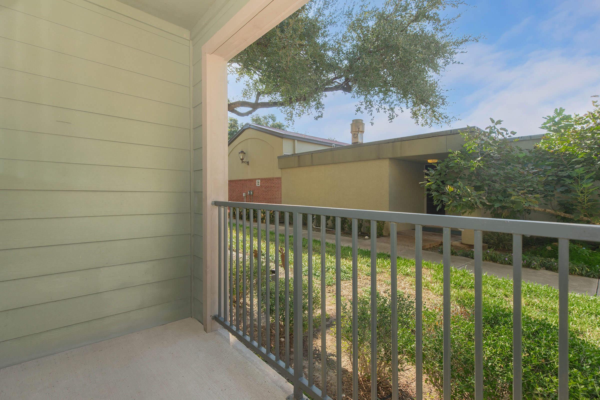 a building with a wooden fence