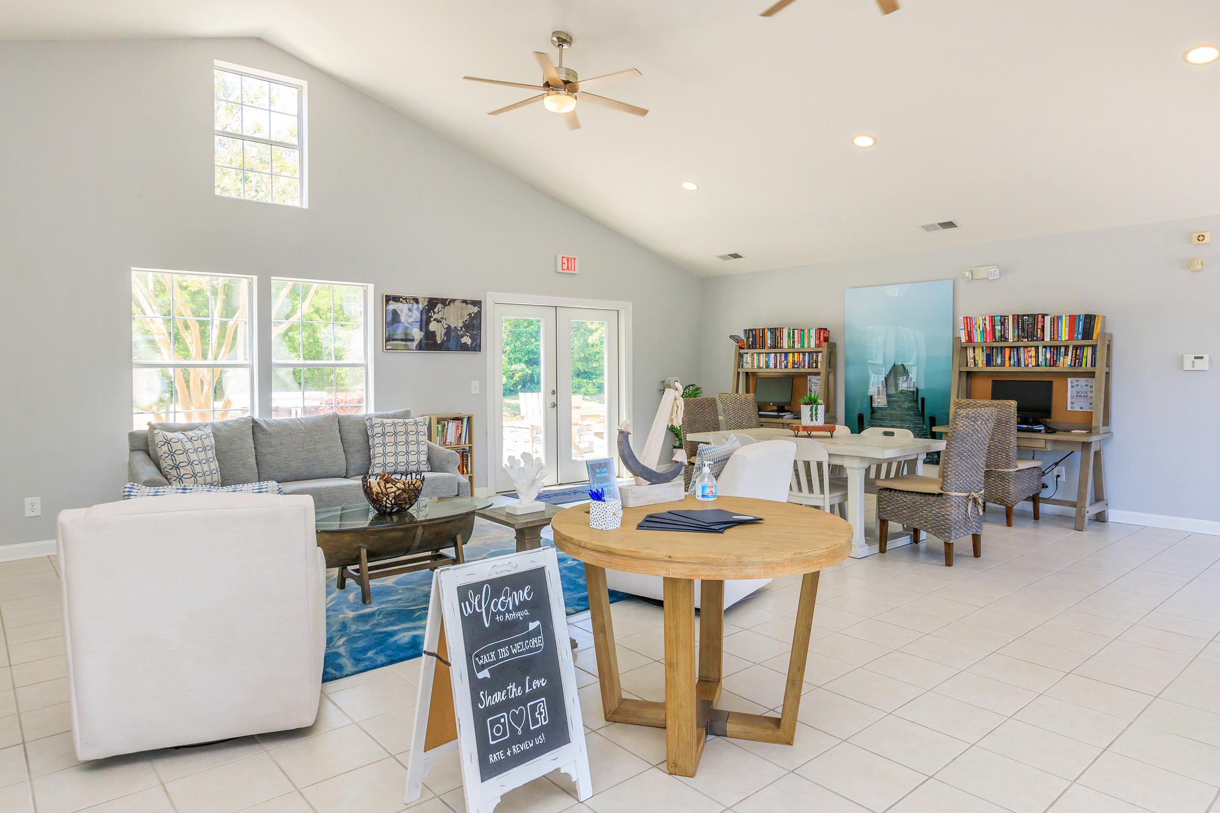 a room filled with furniture and a table