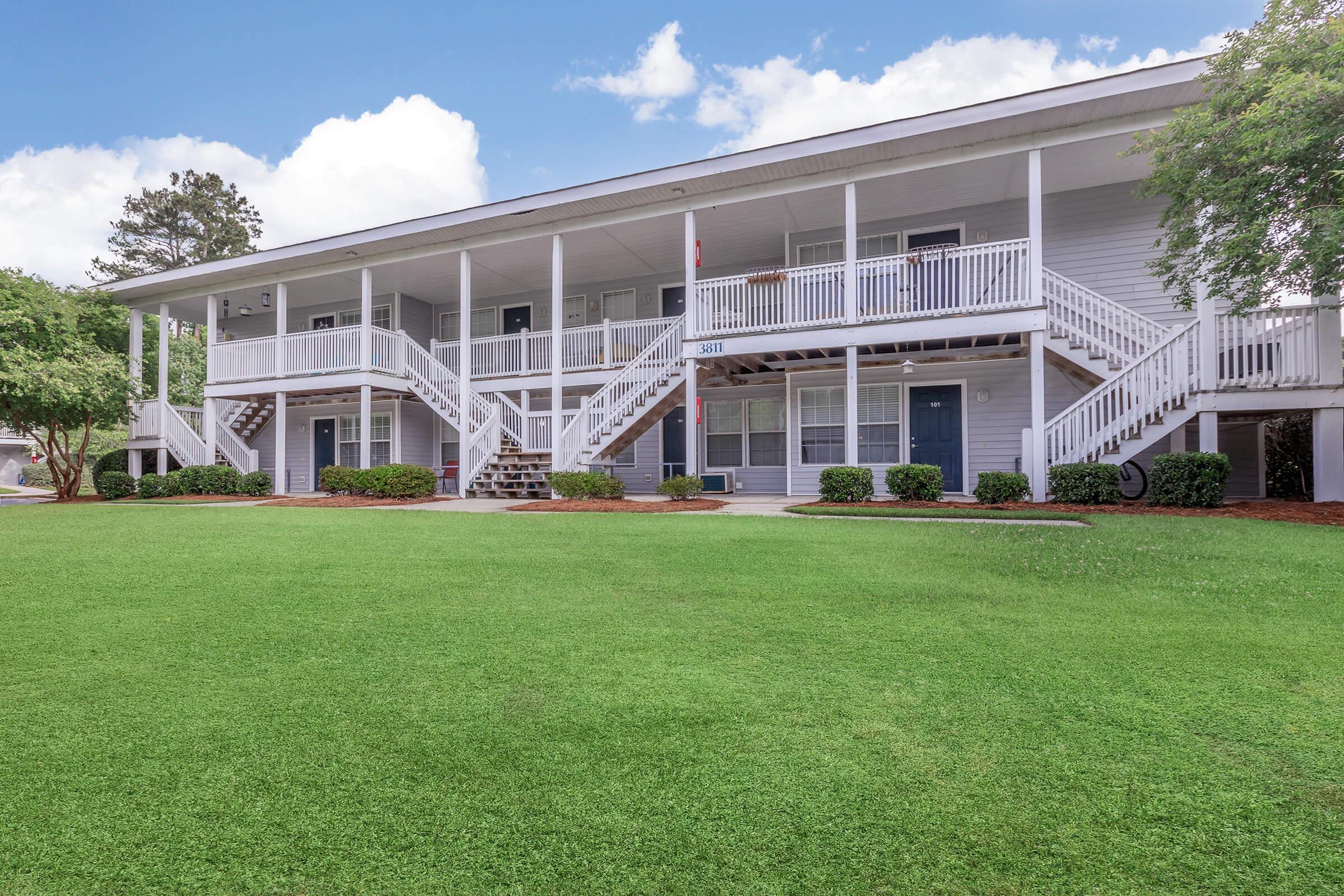 a large lawn in front of a house