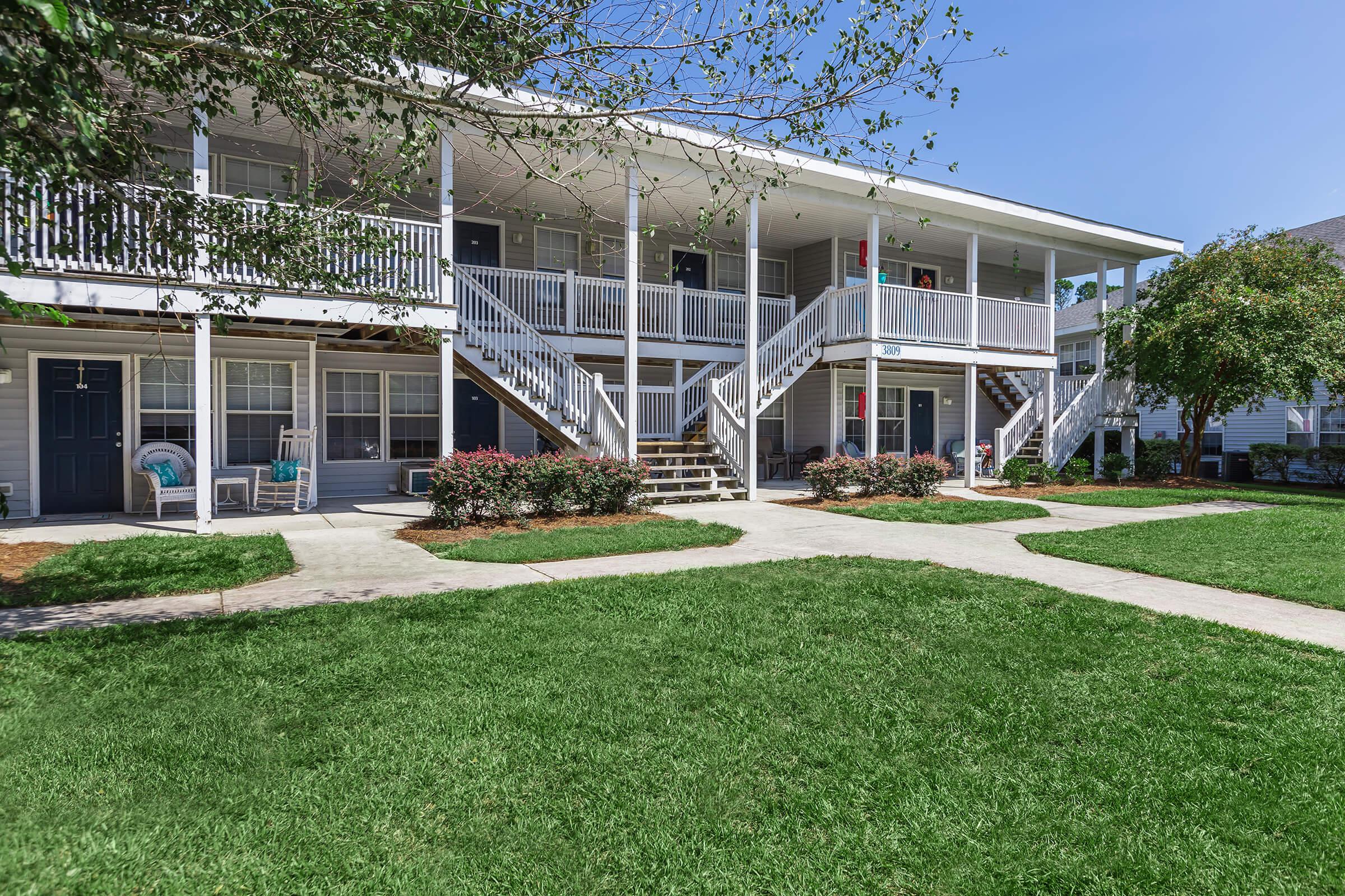 a large lawn in front of a house