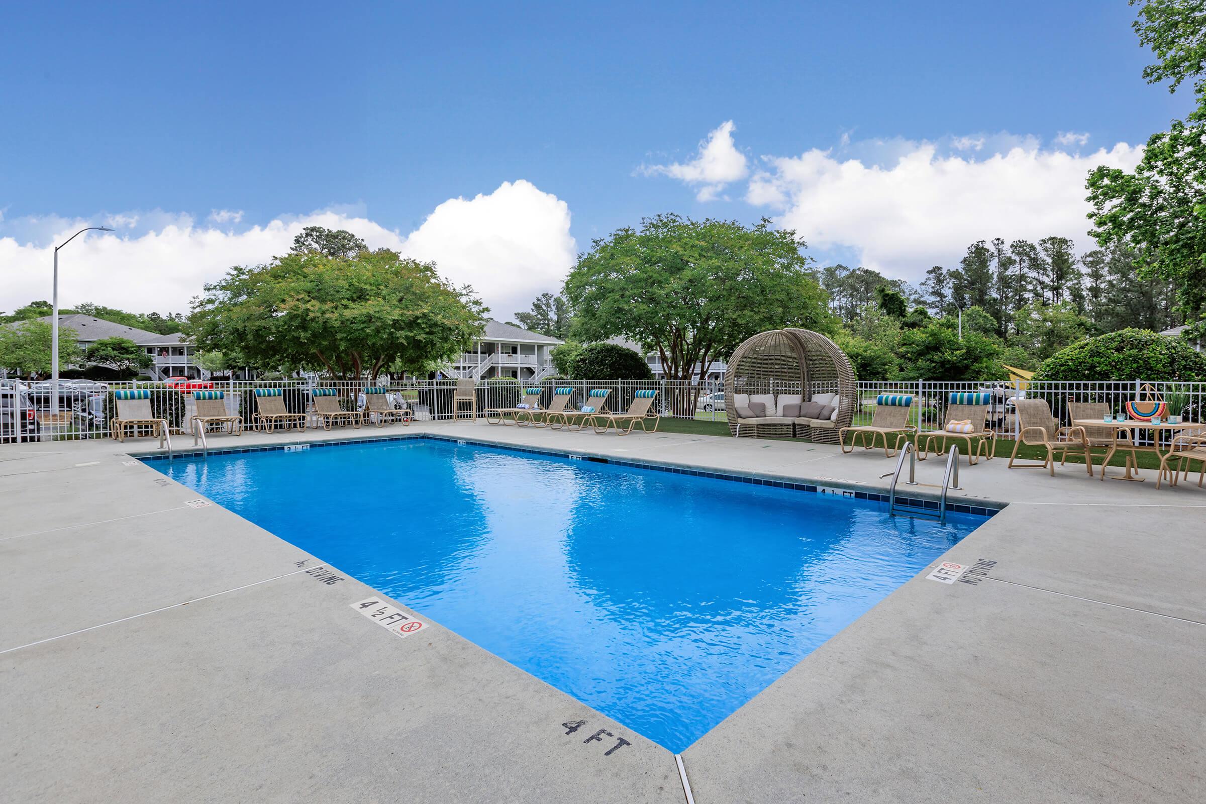 a pool next to a body of water