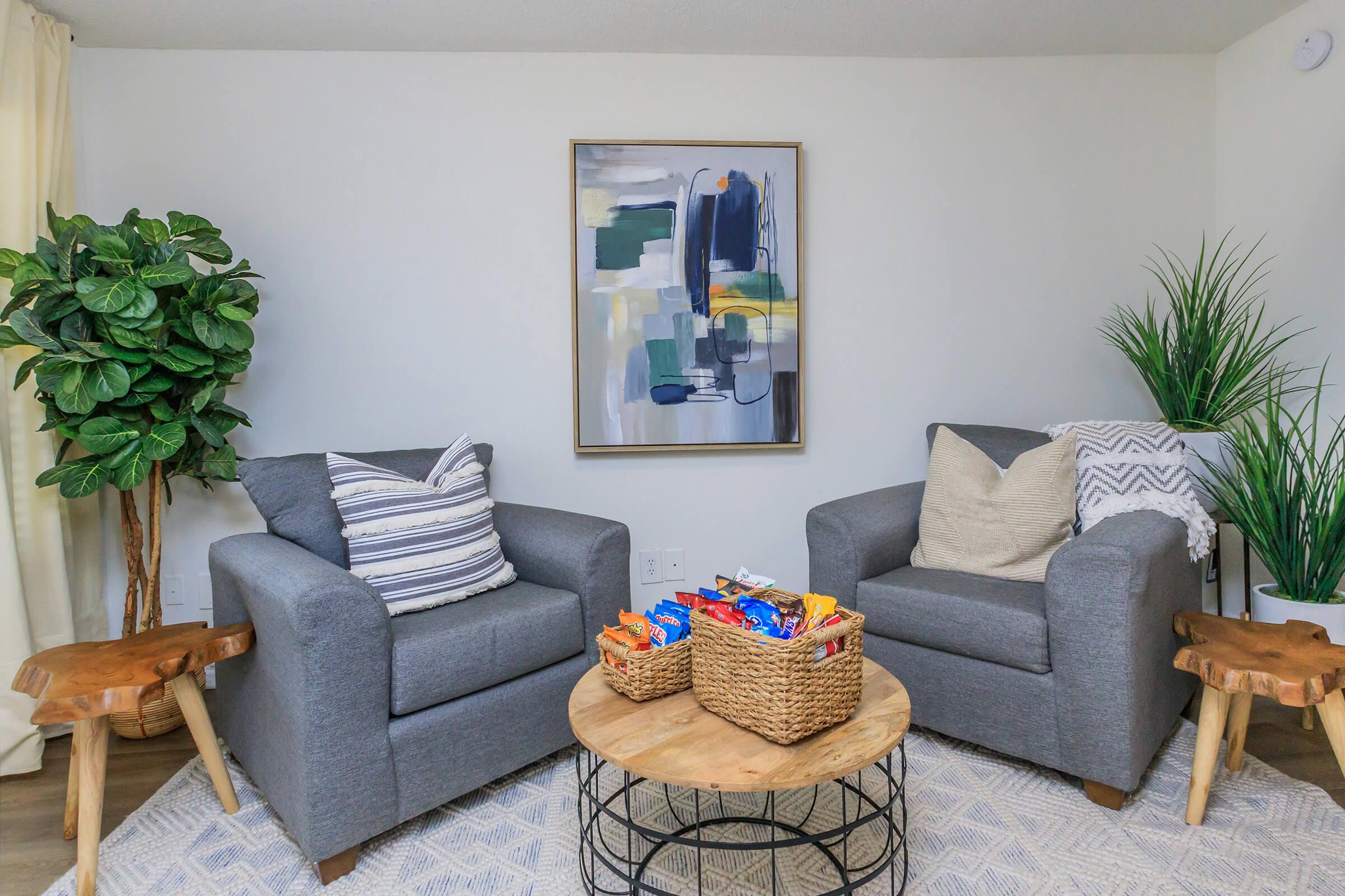 a living room filled with furniture and a fireplace