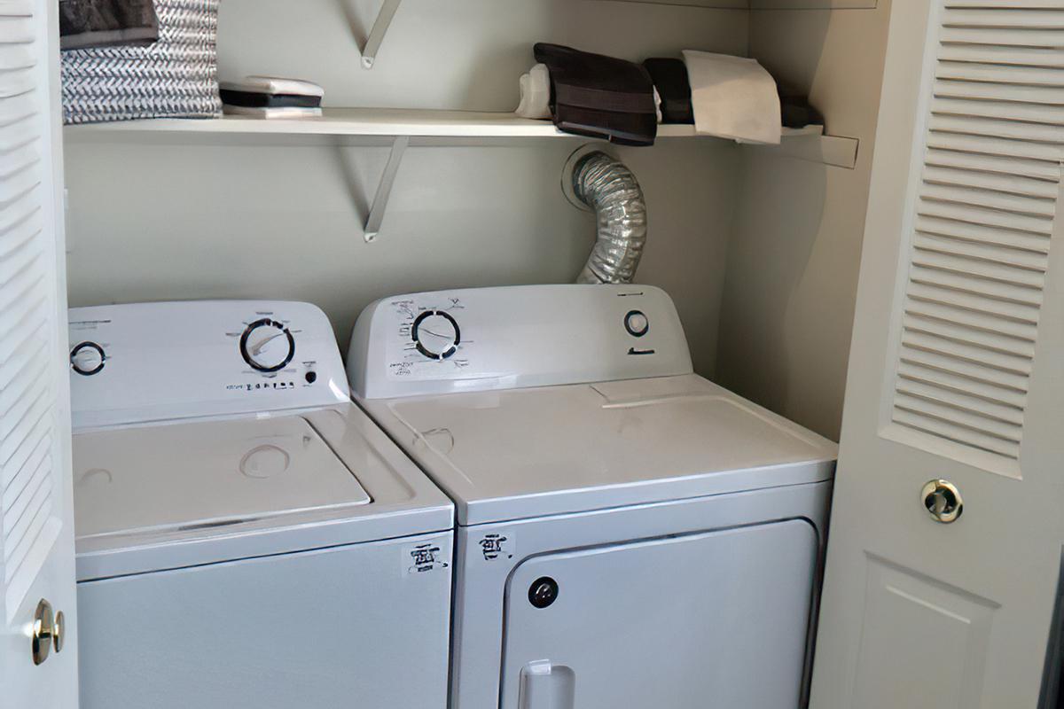a kitchen with a sink and a microwave