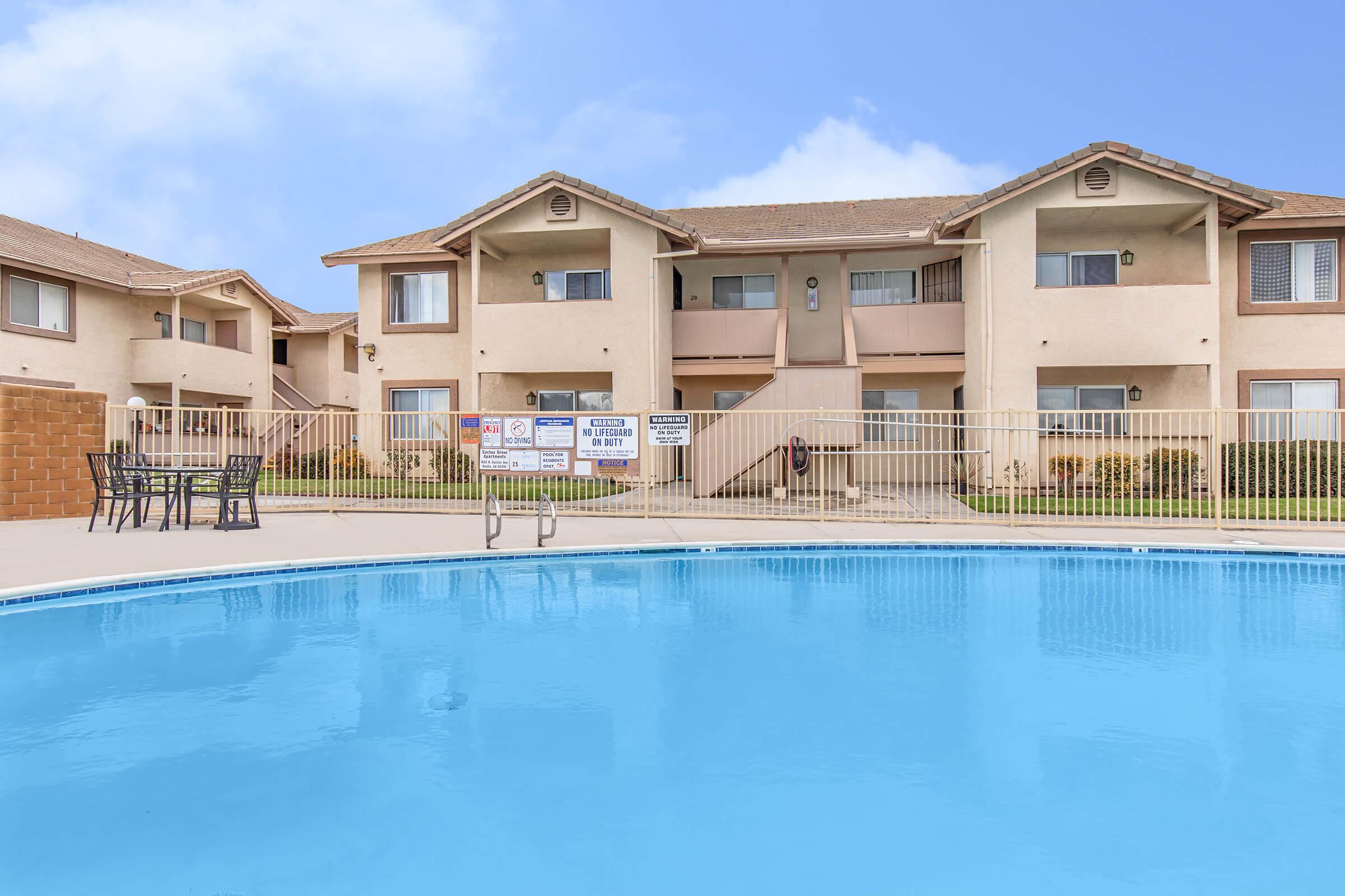 a house with a large pool of water