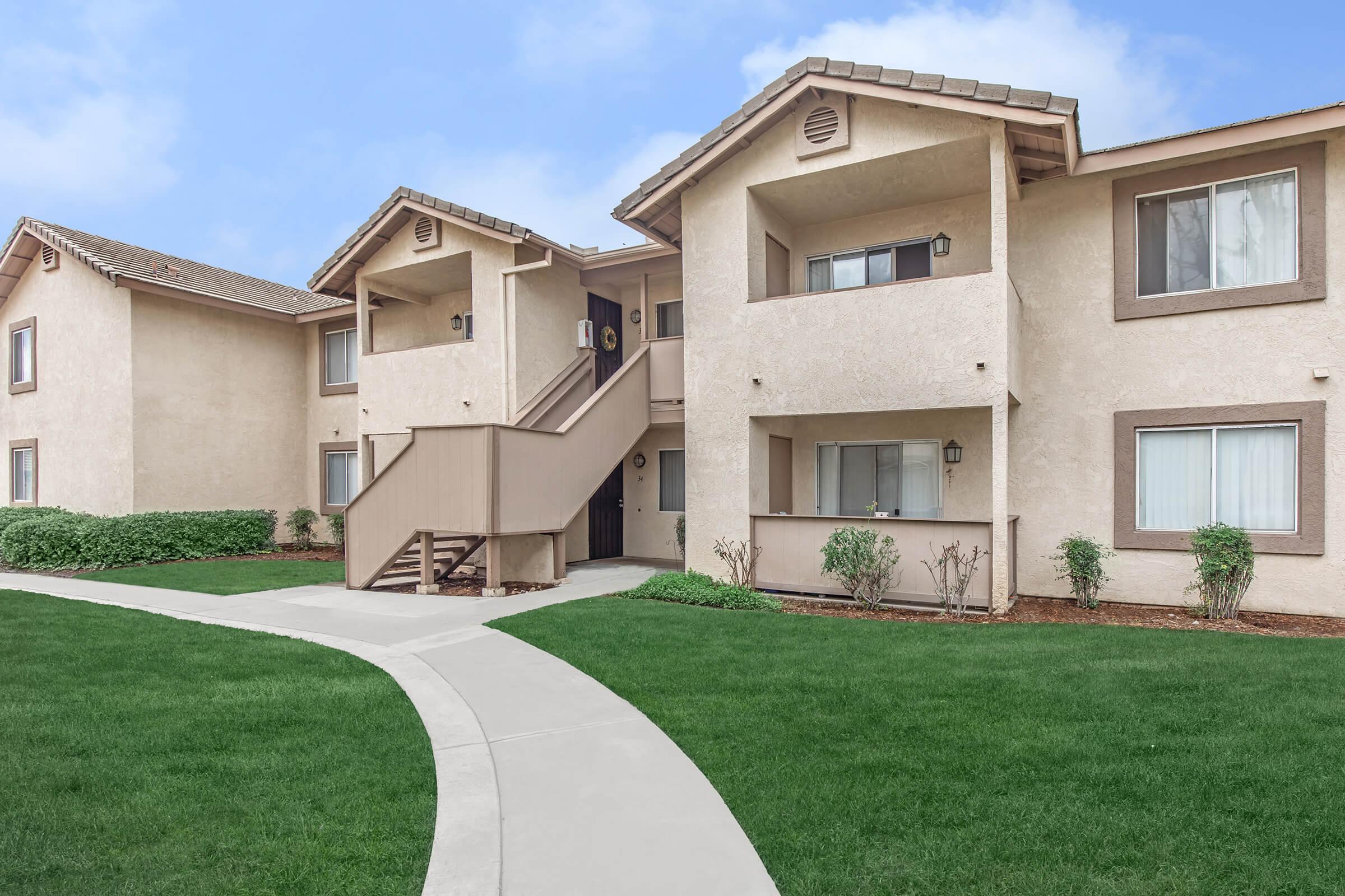 a large lawn in front of a house