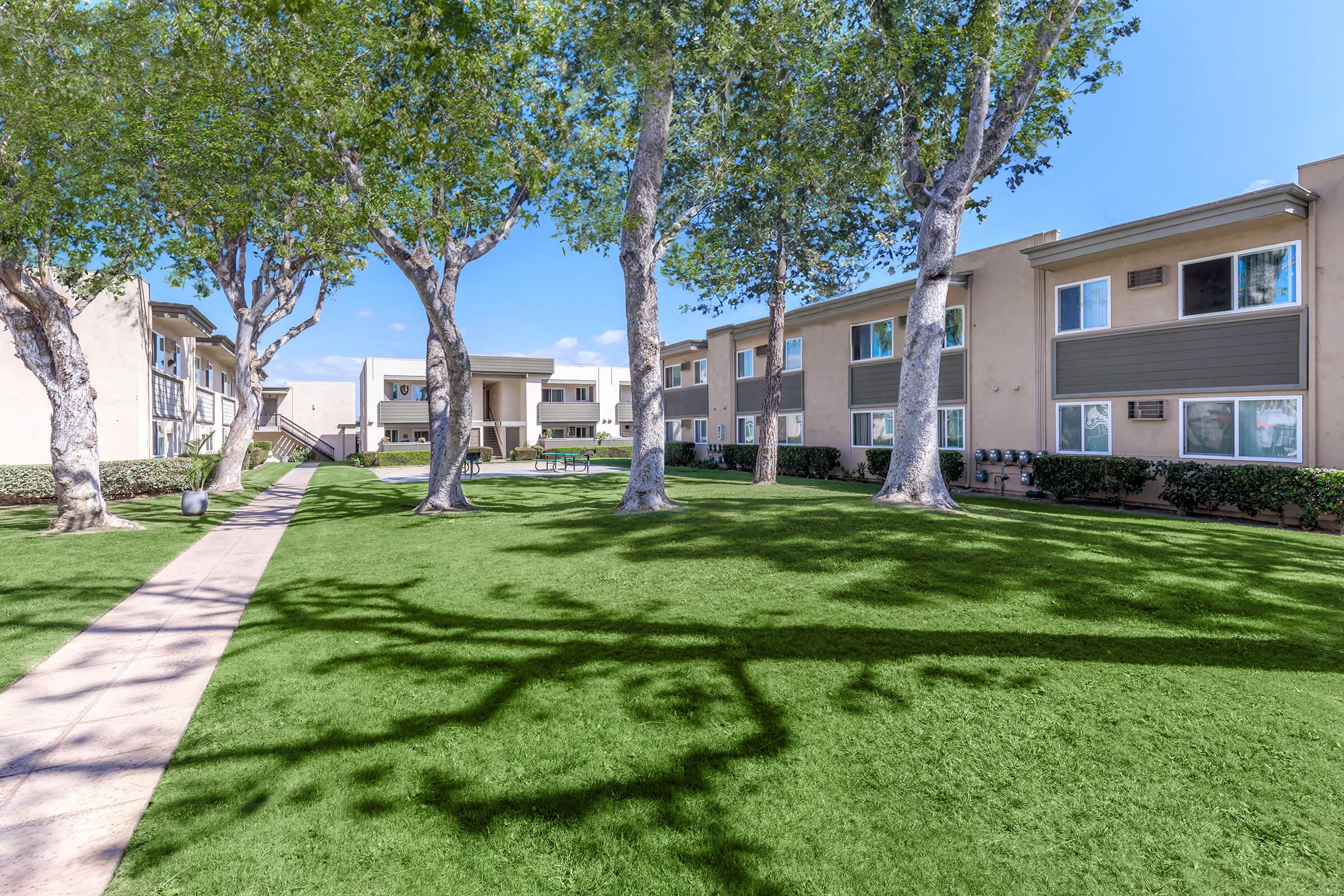 a large lawn in front of a house