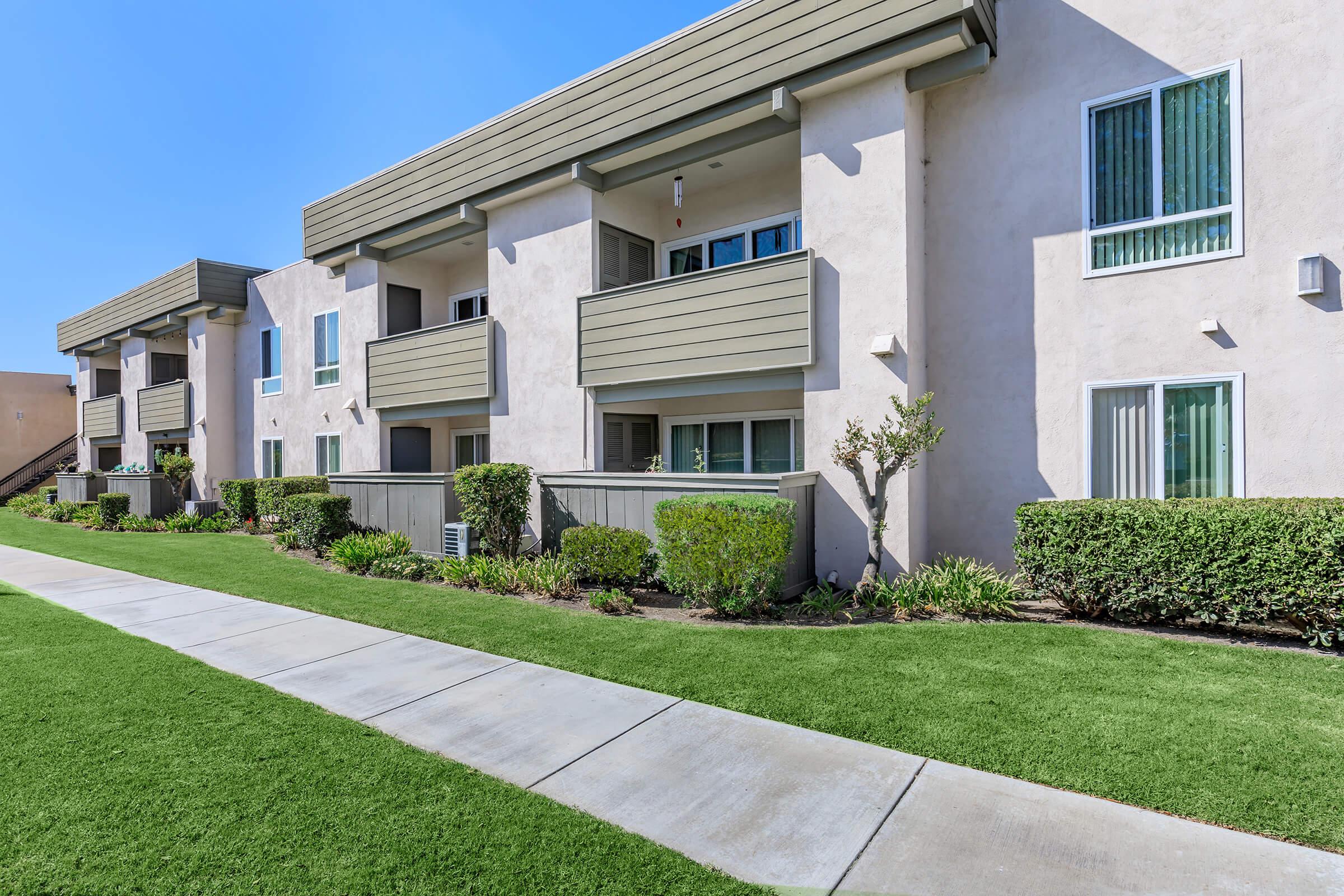 a large lawn in front of a building