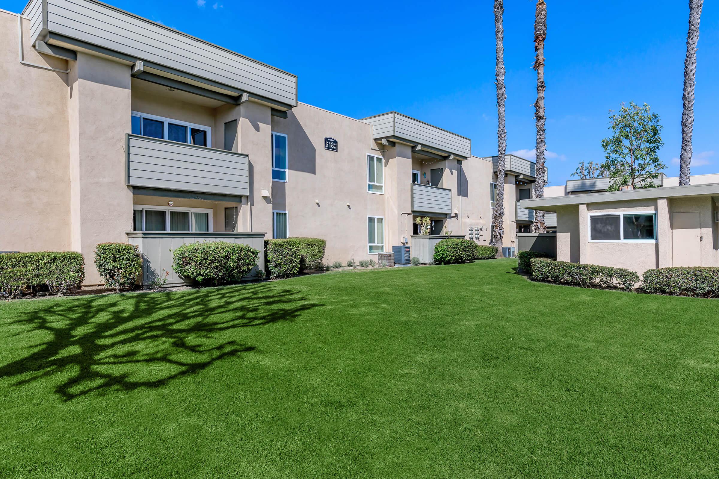 a large lawn in front of a house