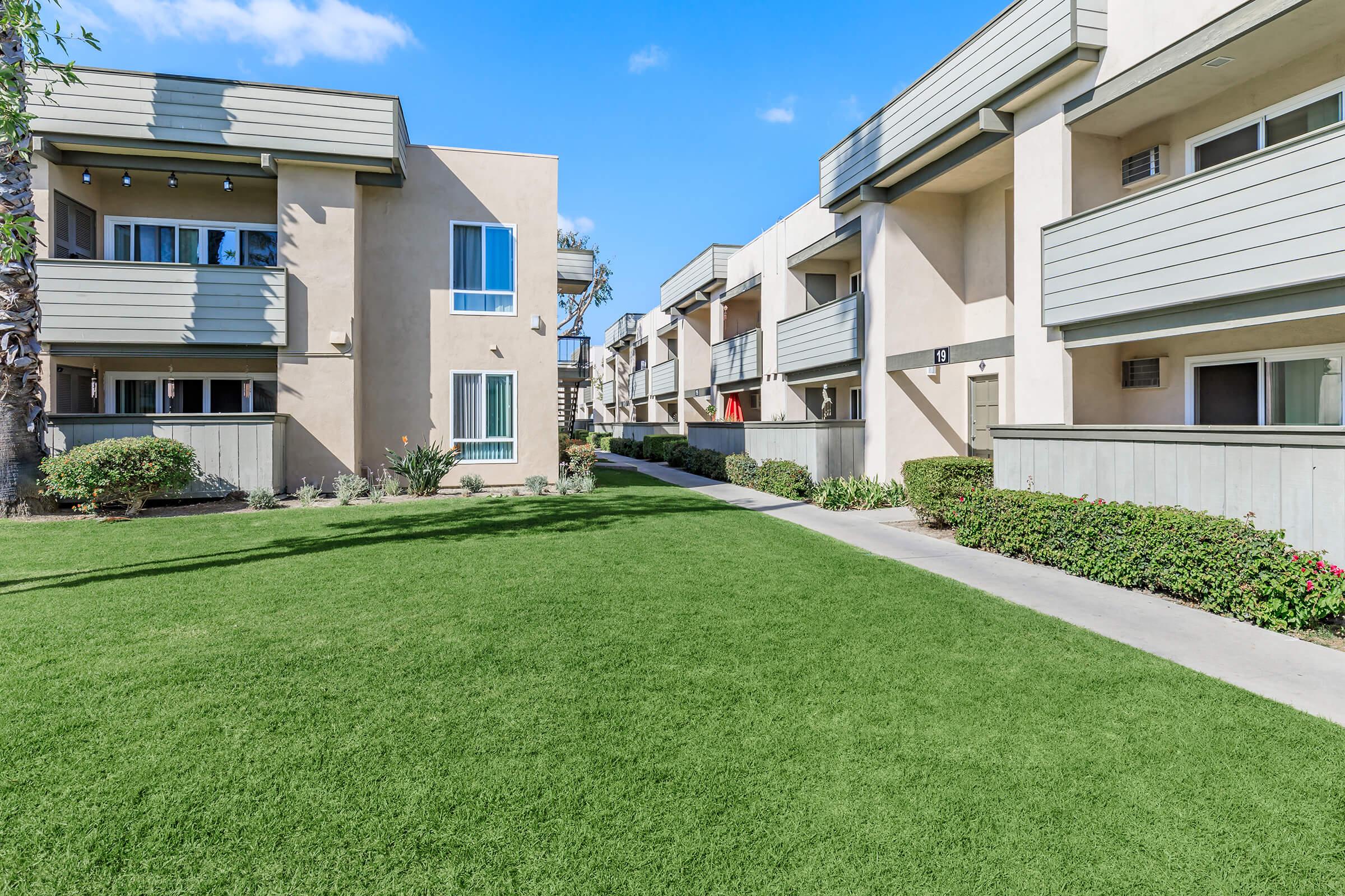 a large lawn in front of a house