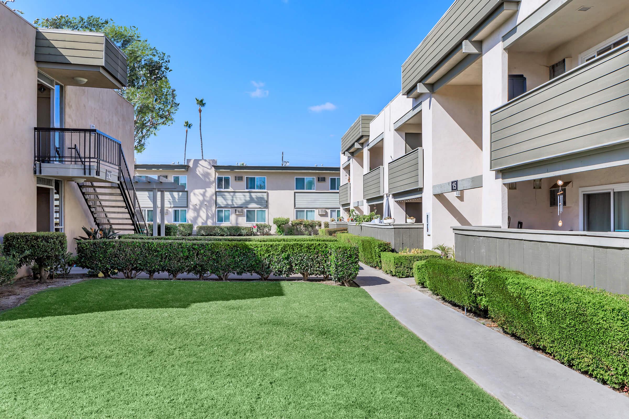 a large lawn in front of a house