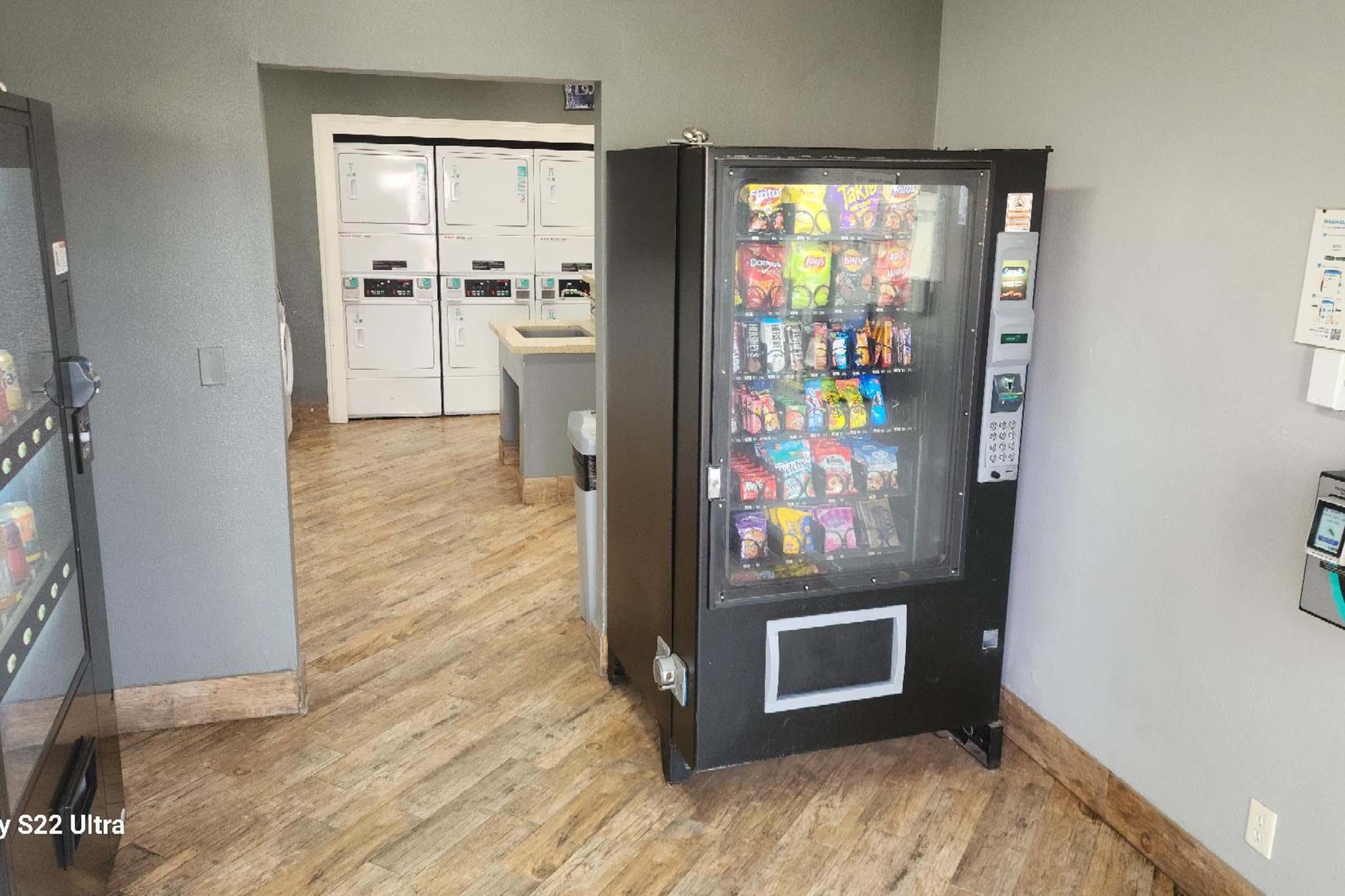 a refrigerator freezer sitting in a room