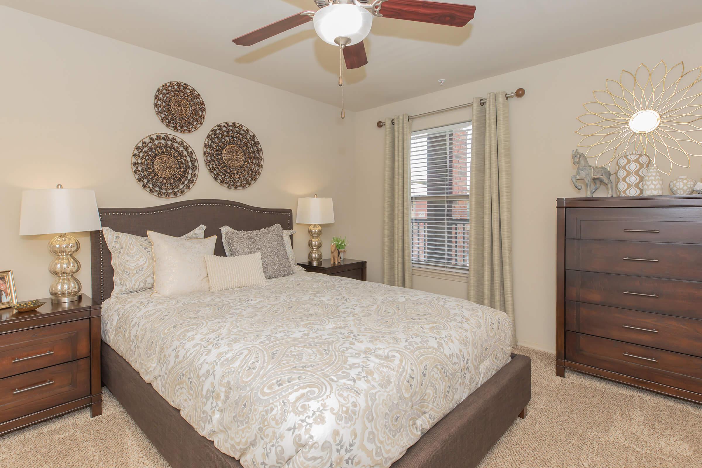 a bedroom with a bed in a hotel room