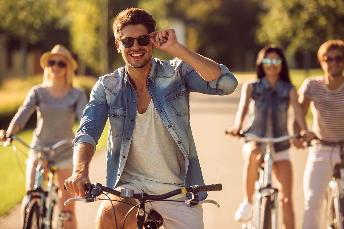 Friends cycling in park.jpg