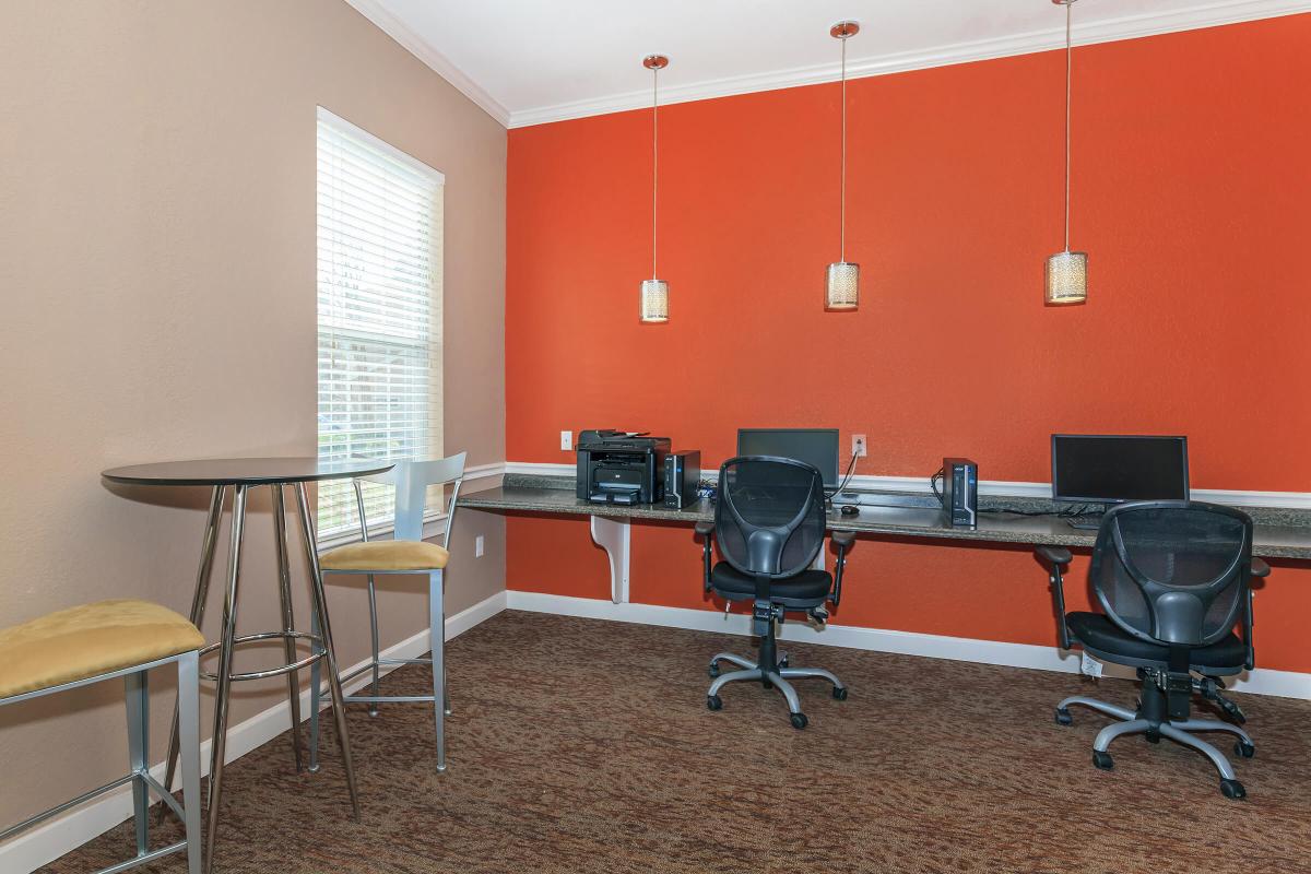 a large red chair in a room