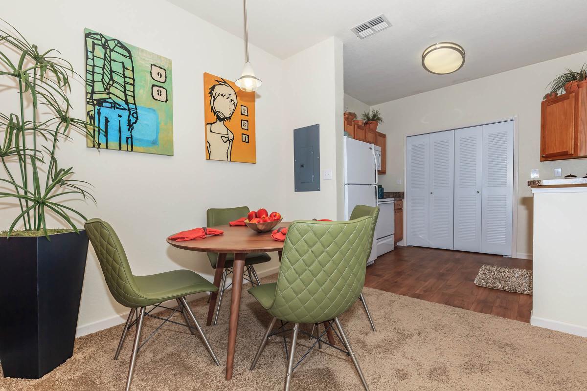 a living room filled with furniture and a tv