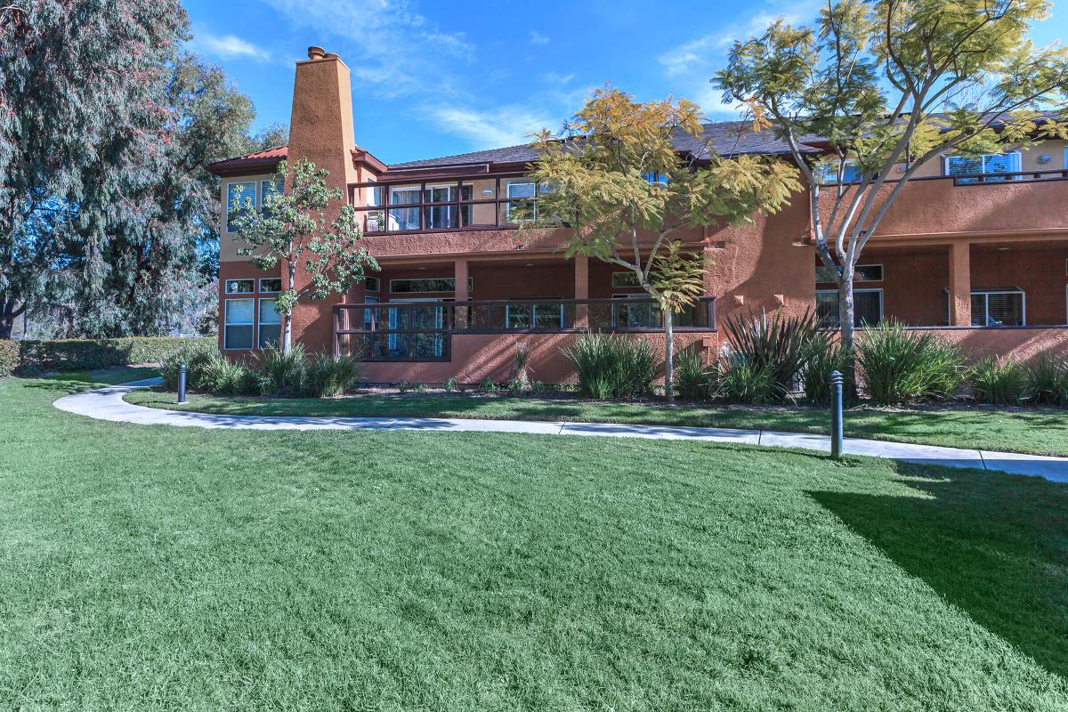 a large lawn in front of a house