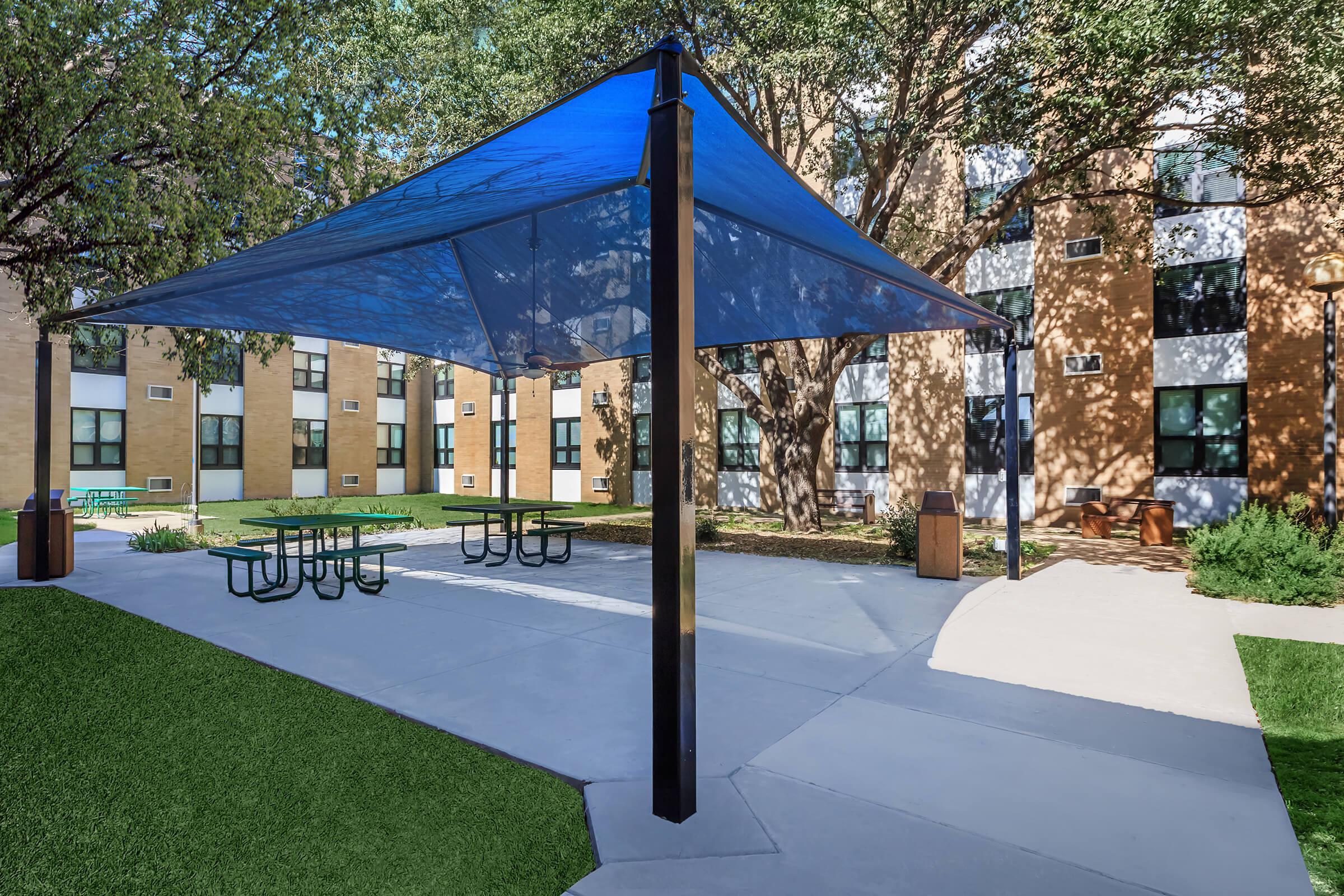 Linwood Square sun shade with picnic tables