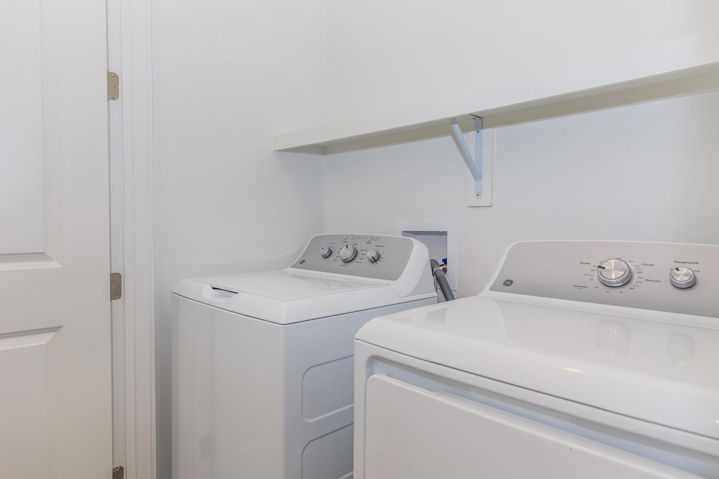 a stove top oven sitting inside of a kitchen