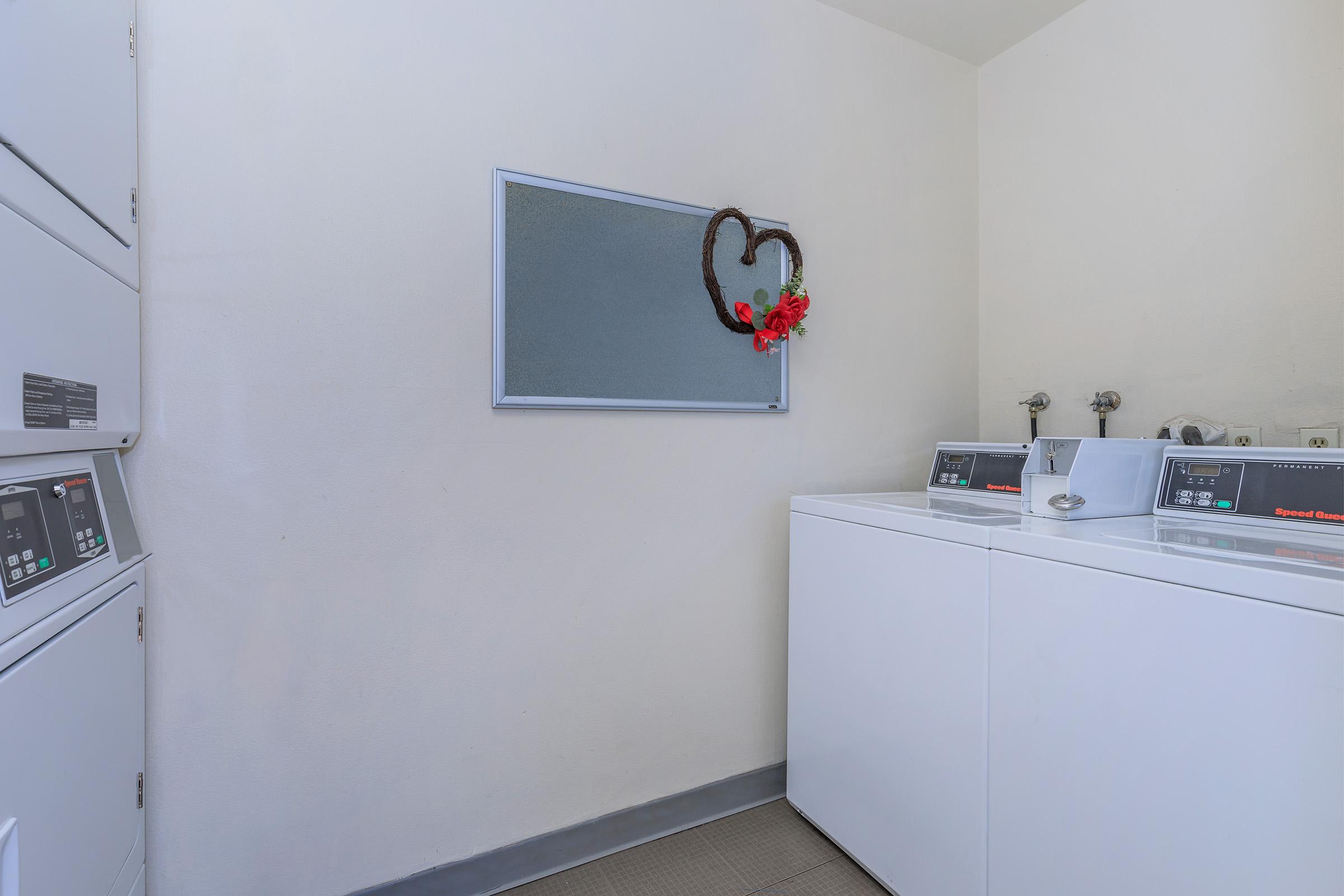 a kitchen with a sink and a refrigerator