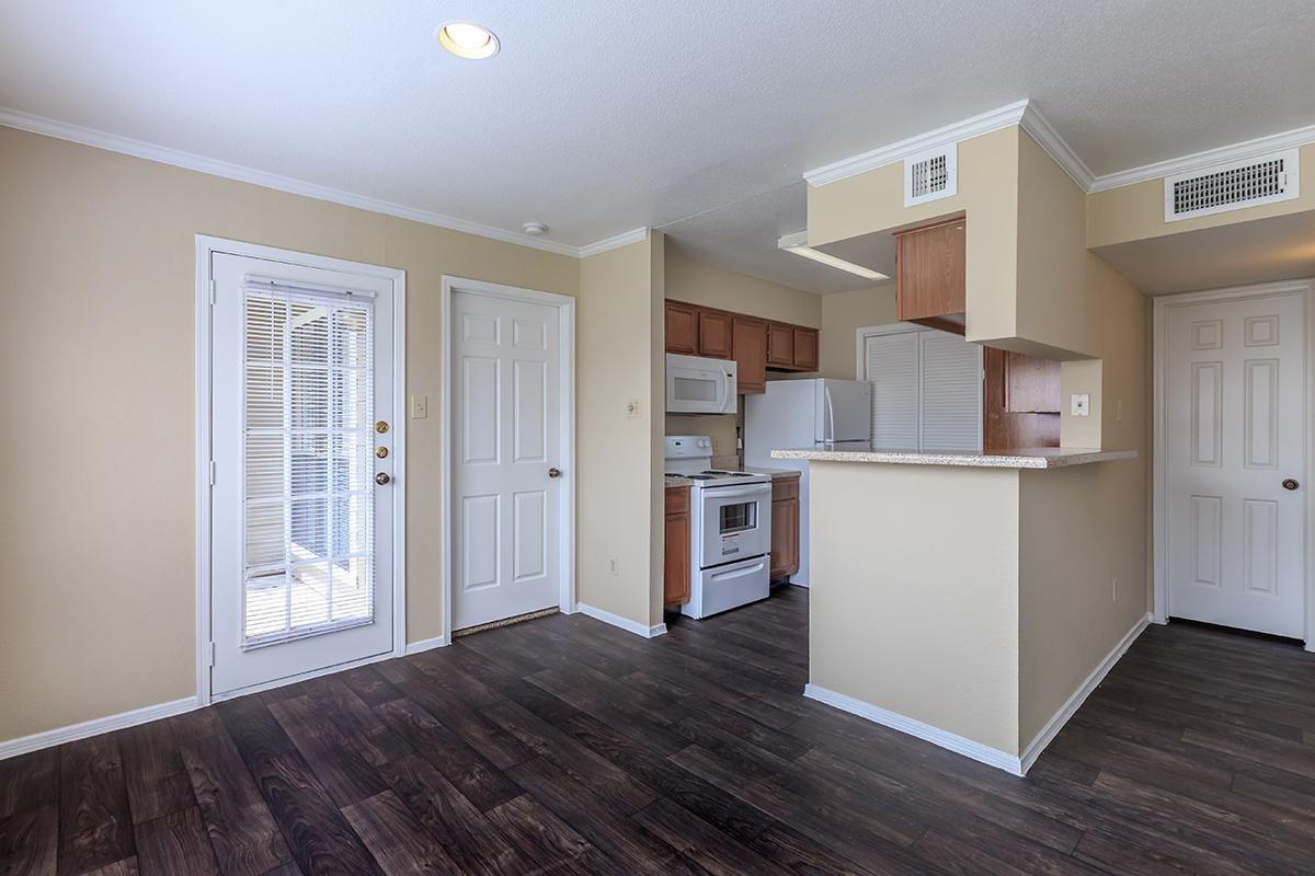 a kitchen with a wood floor