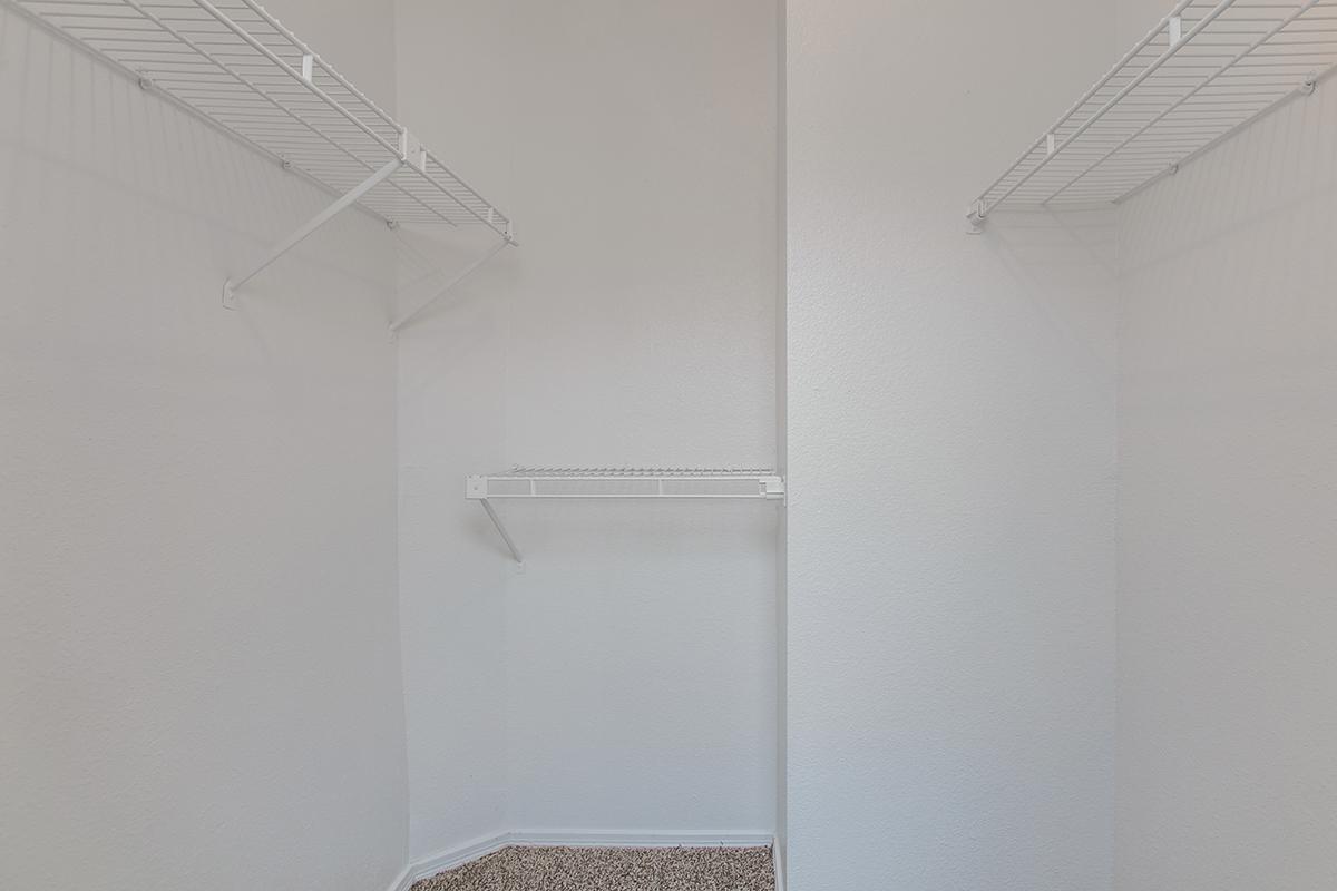 a white tub sitting next to a shower