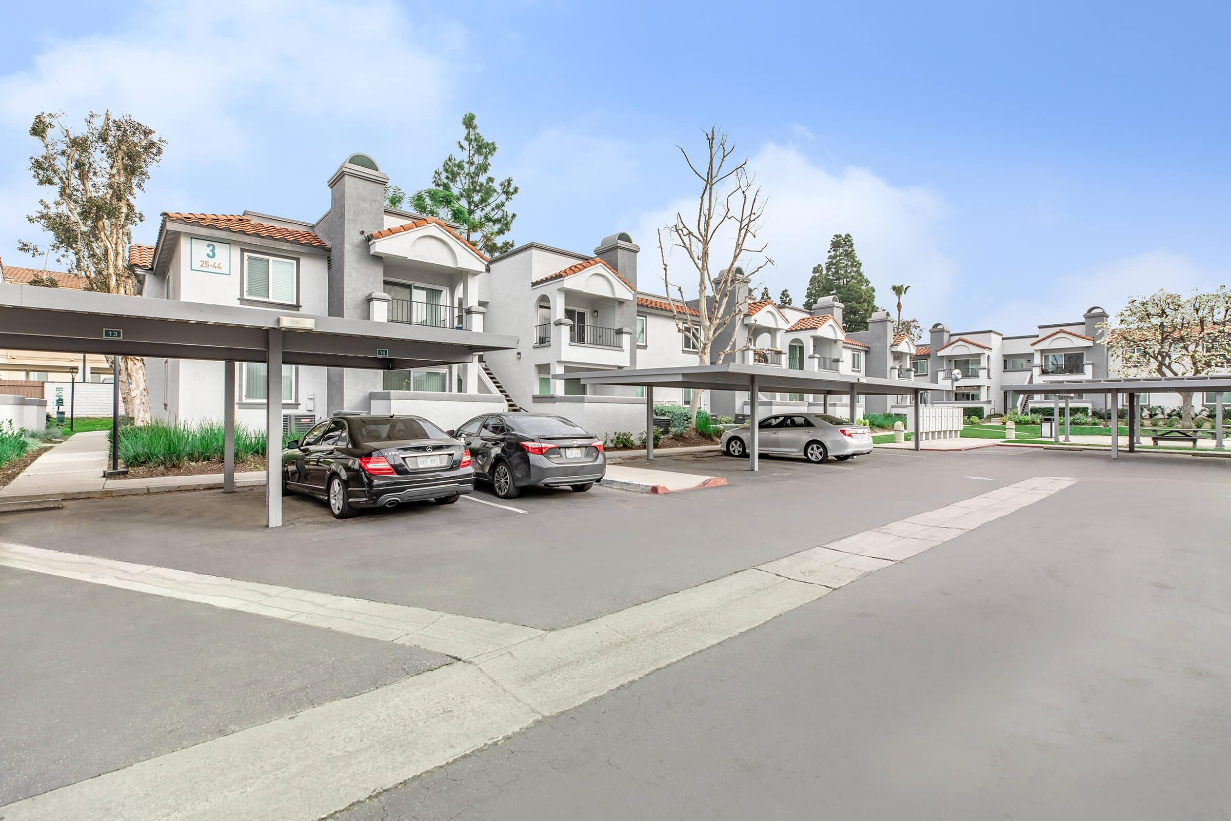 a street with cars parked on the side of a road