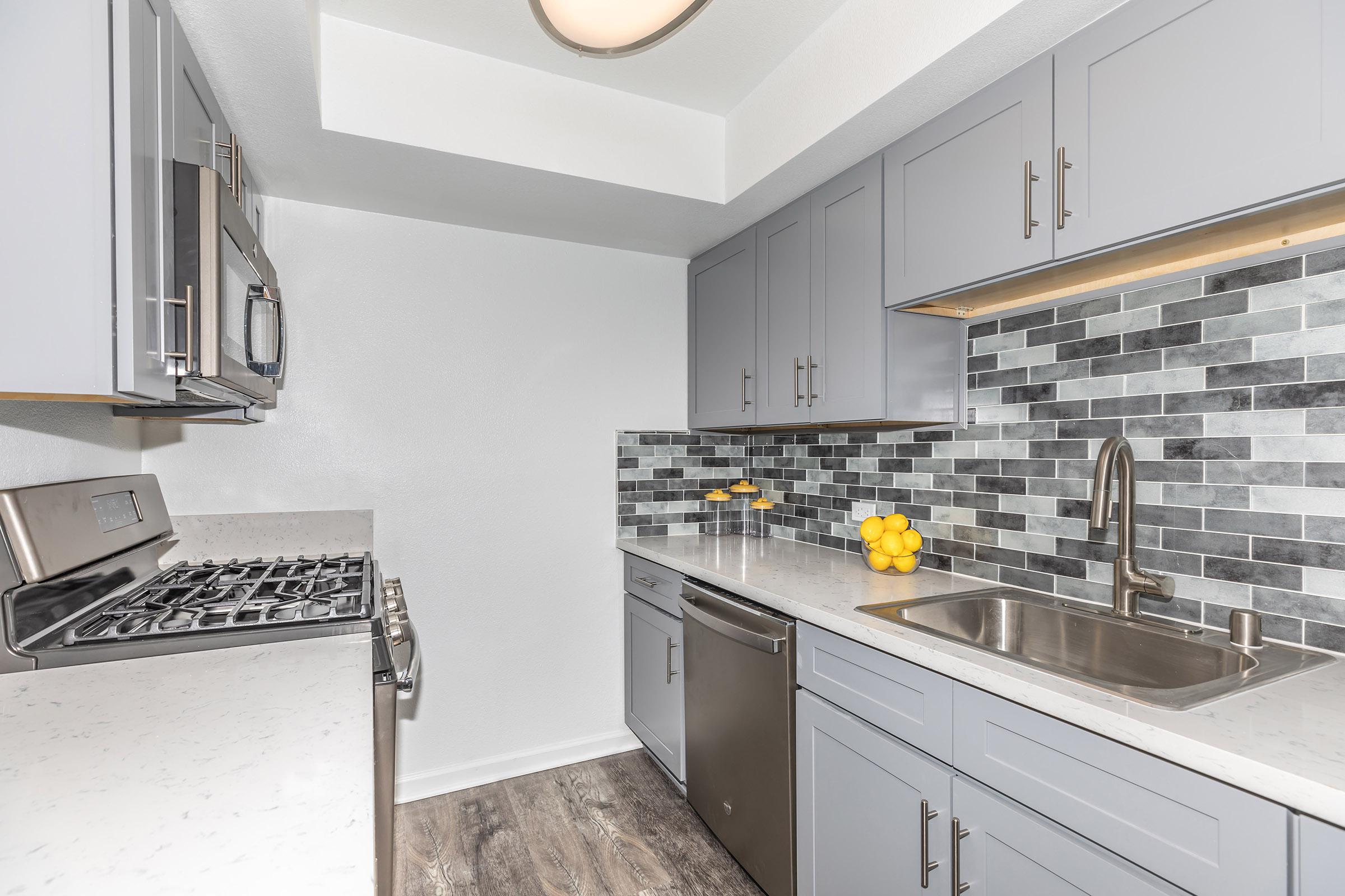 Kitchen at Enclave at Town Square Apartments in Chino, CA