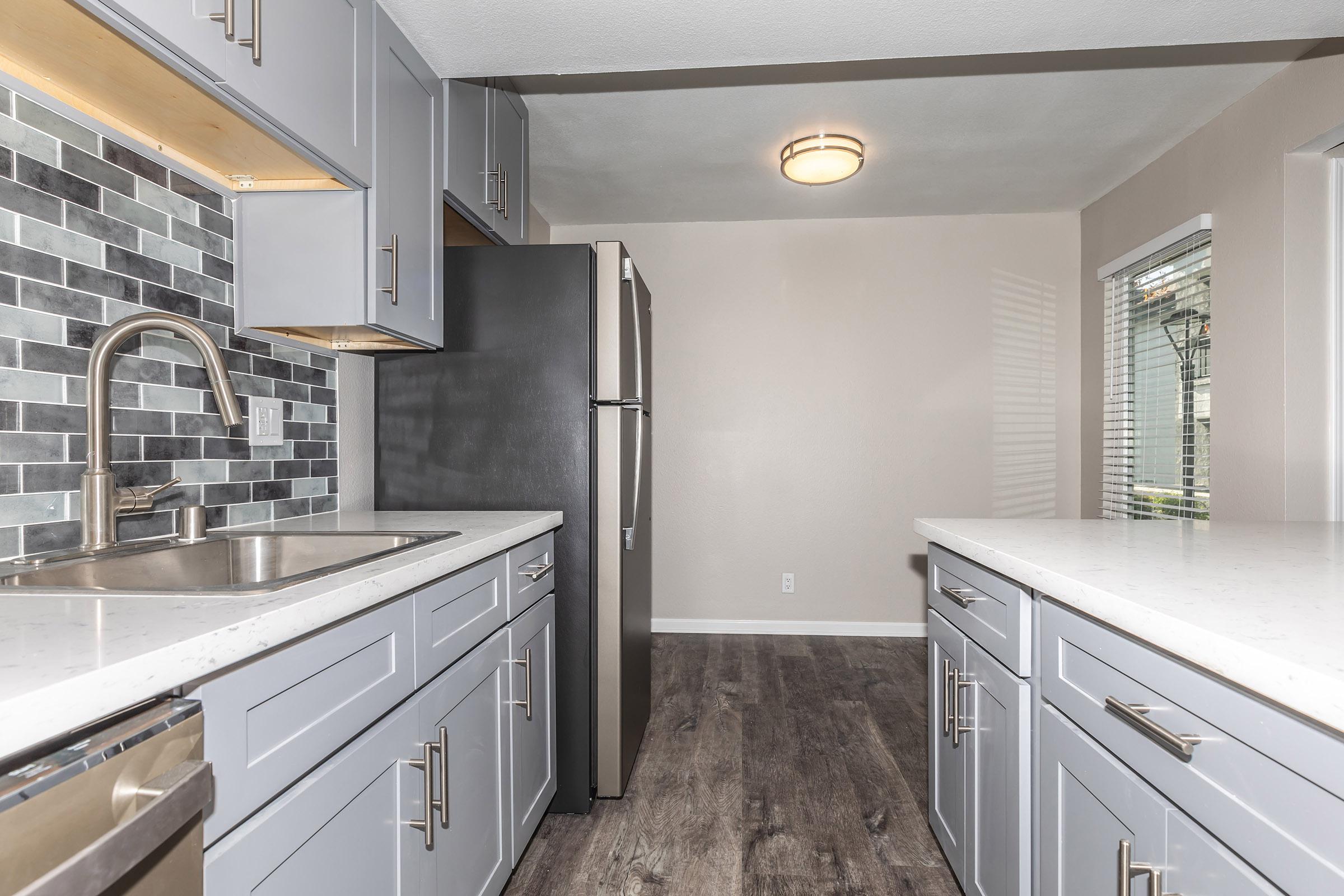 Kitchen at Enclave at Town Square Apartments in Chino, CA