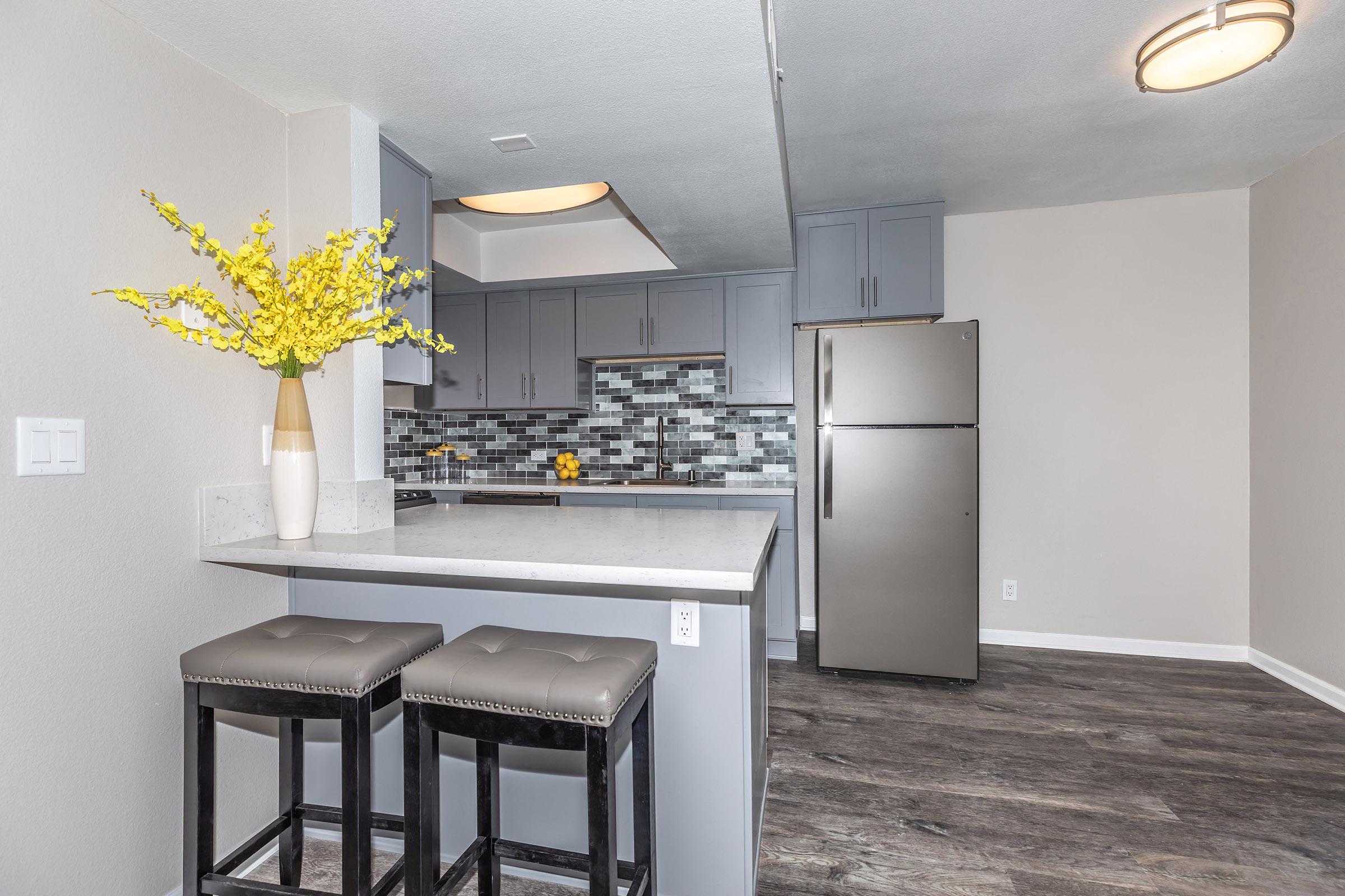 Kitchen at Enclave at Town Square Apartments in Chino, CA