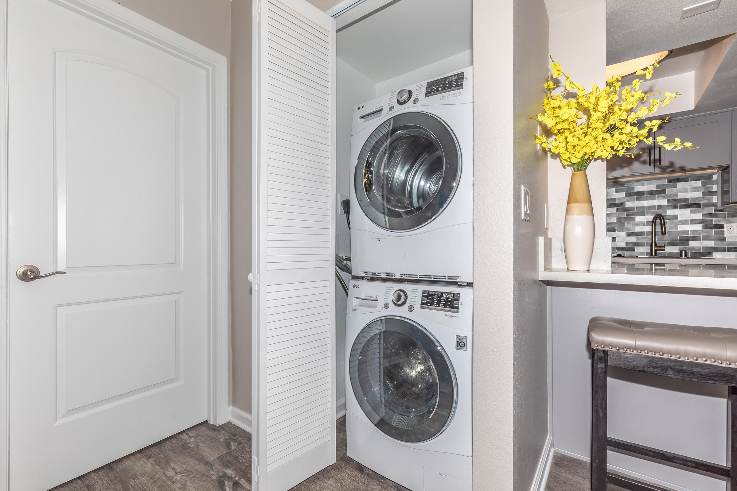 Laundry at Enclave at Town Square Apartments in Chino, CA